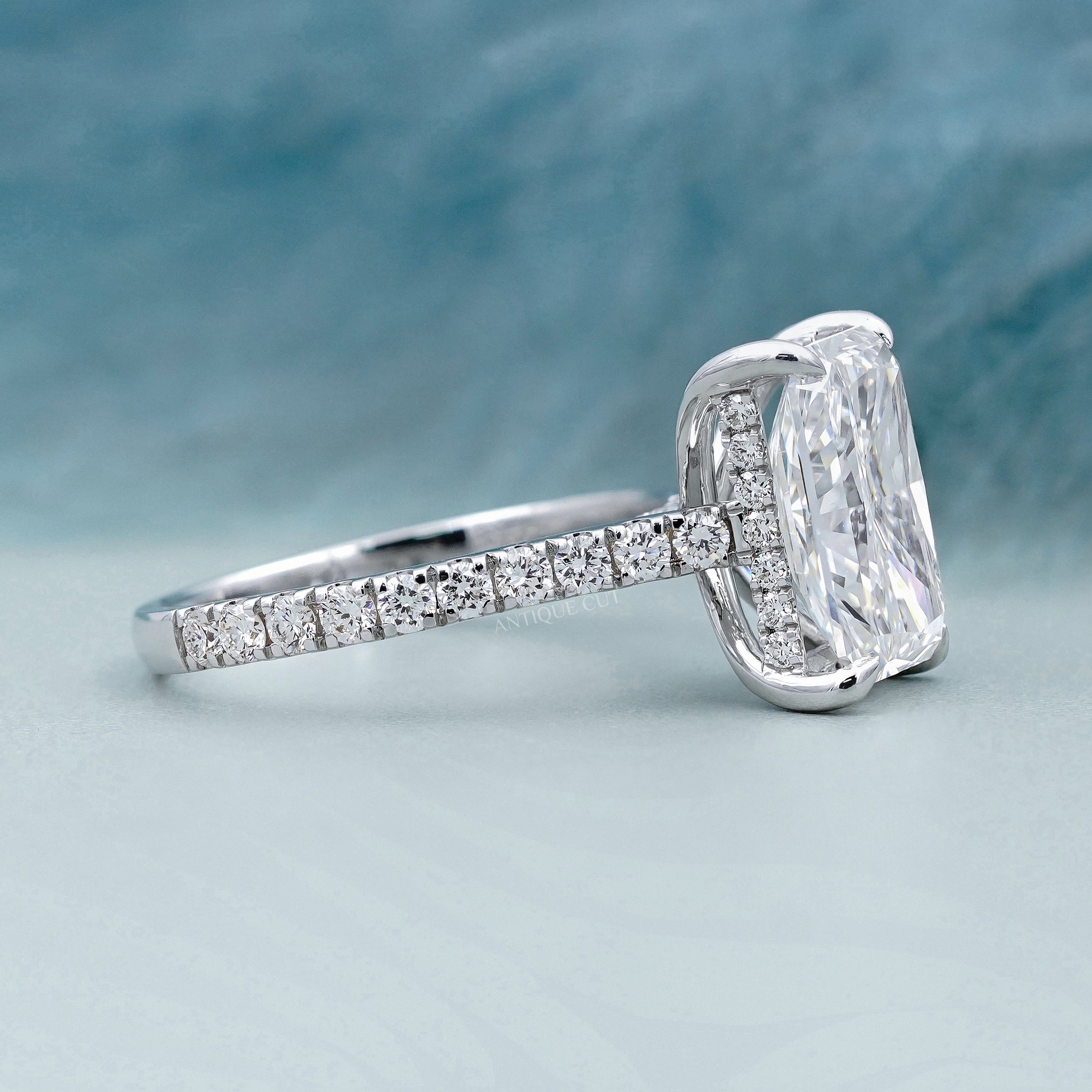White gold radiant diamond ring with hidden halo