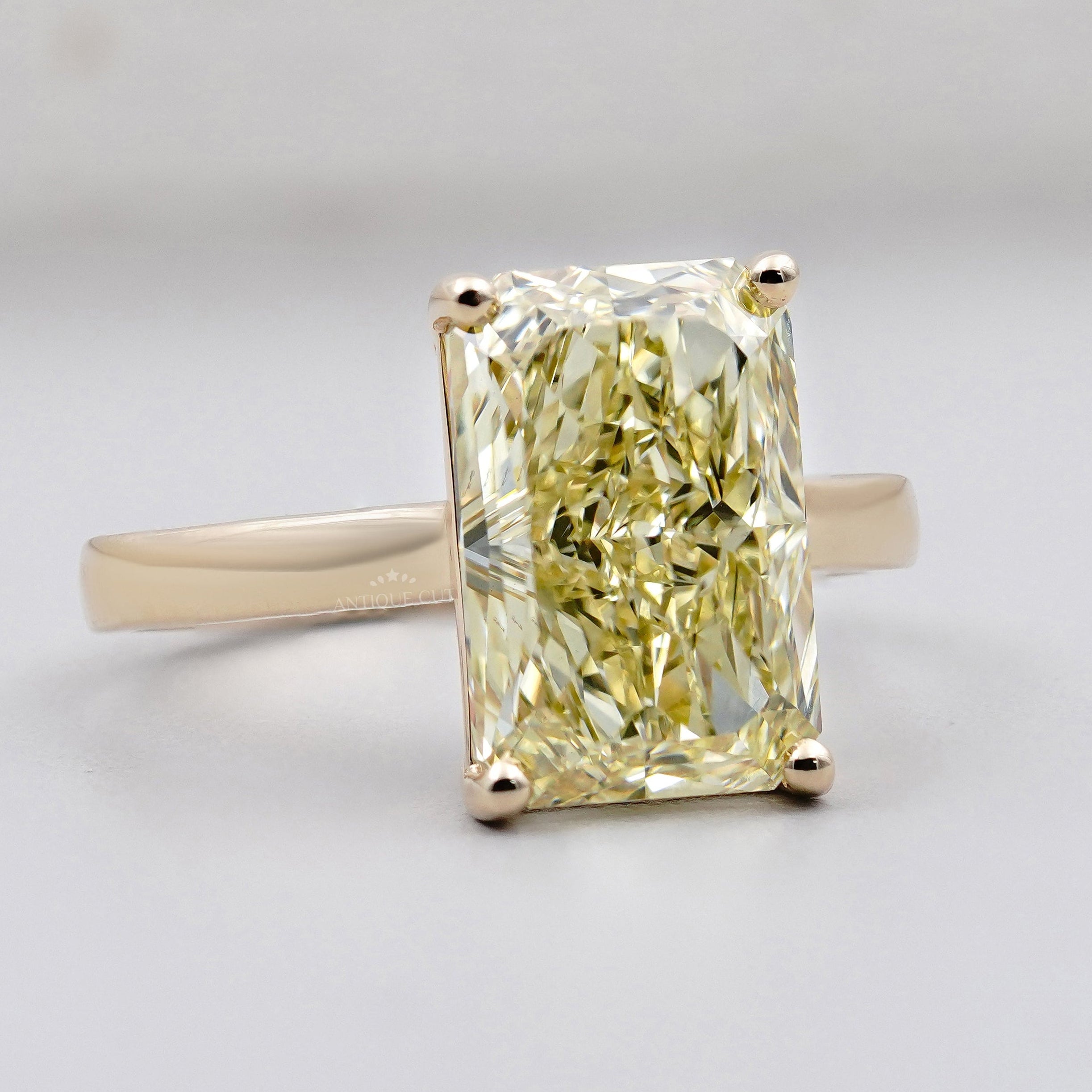 IGI Certified Radiant Cut Fancy Yellow Diamond Ring