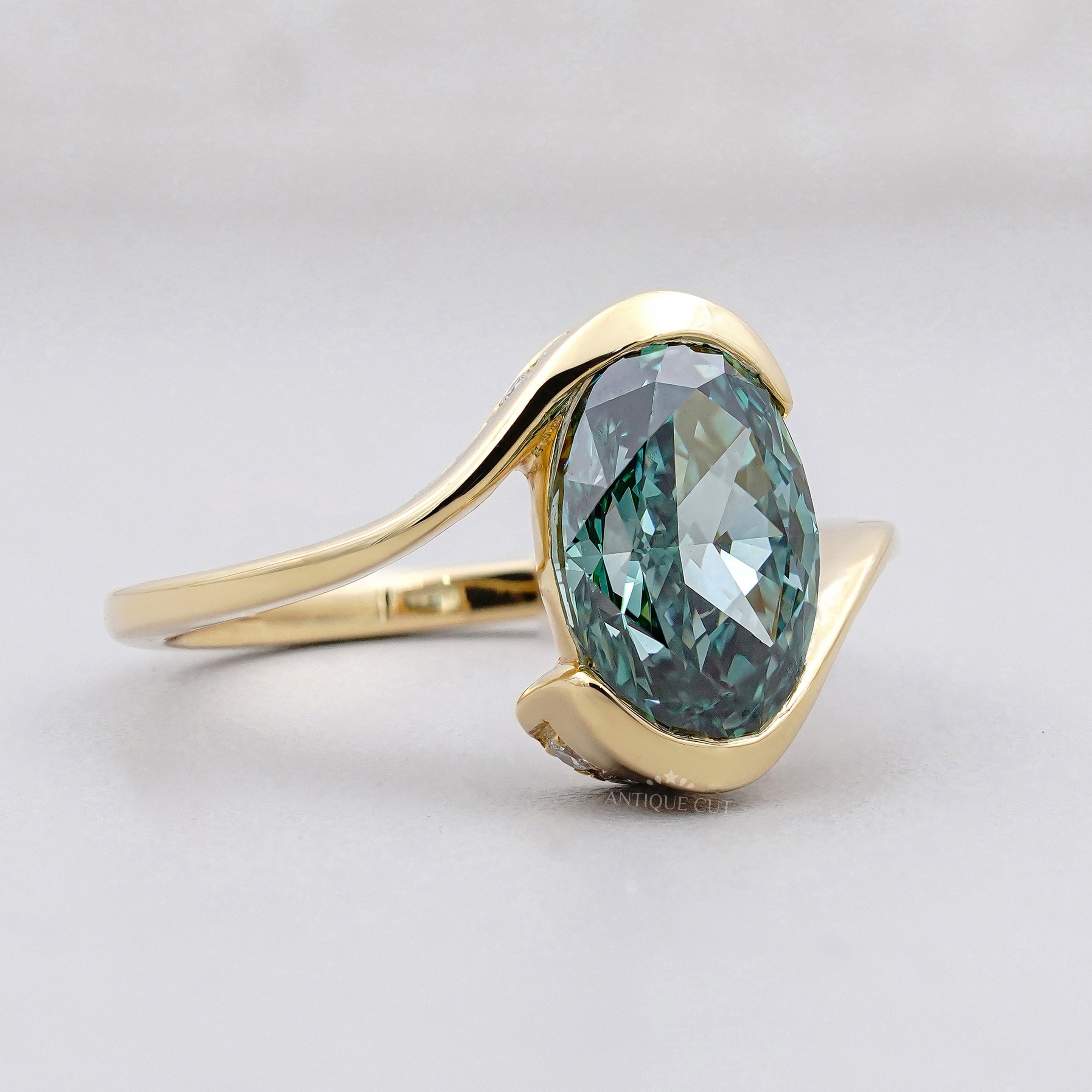 Yellow Gold Fancy Green Oval Diamond Engagement Ring