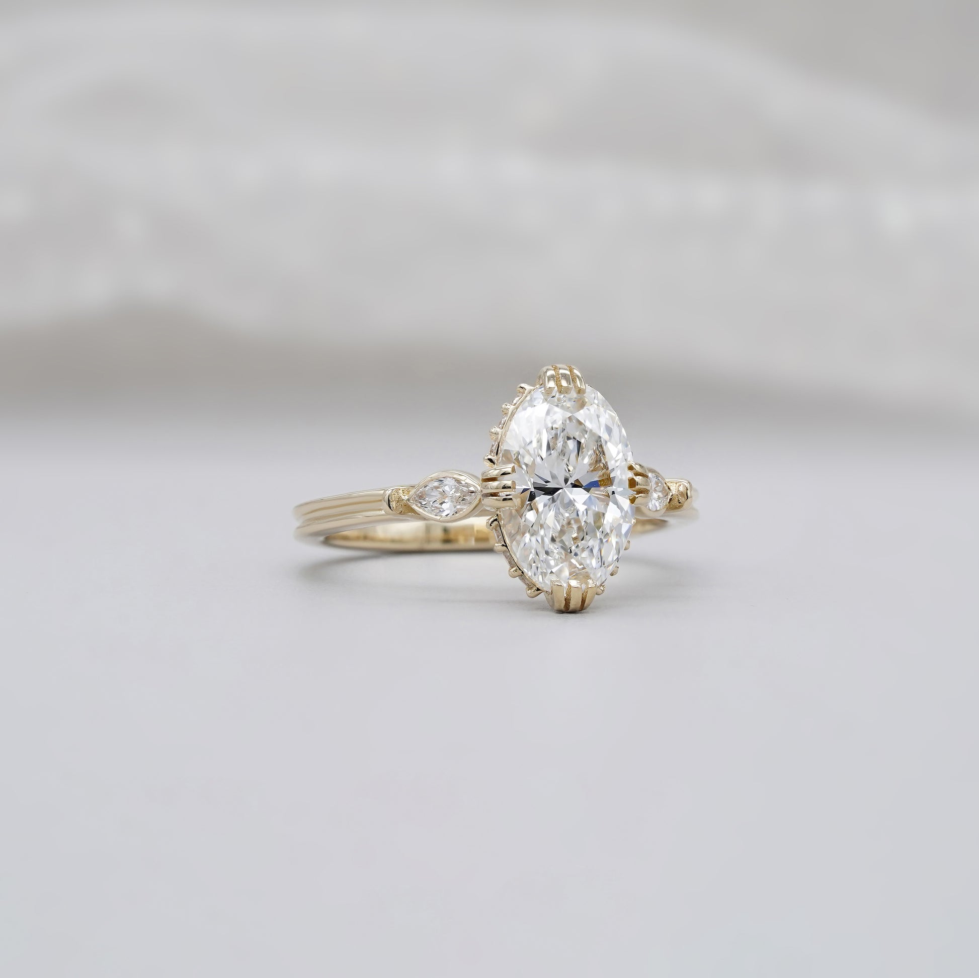 Yellow gold oval diamond engagement ring