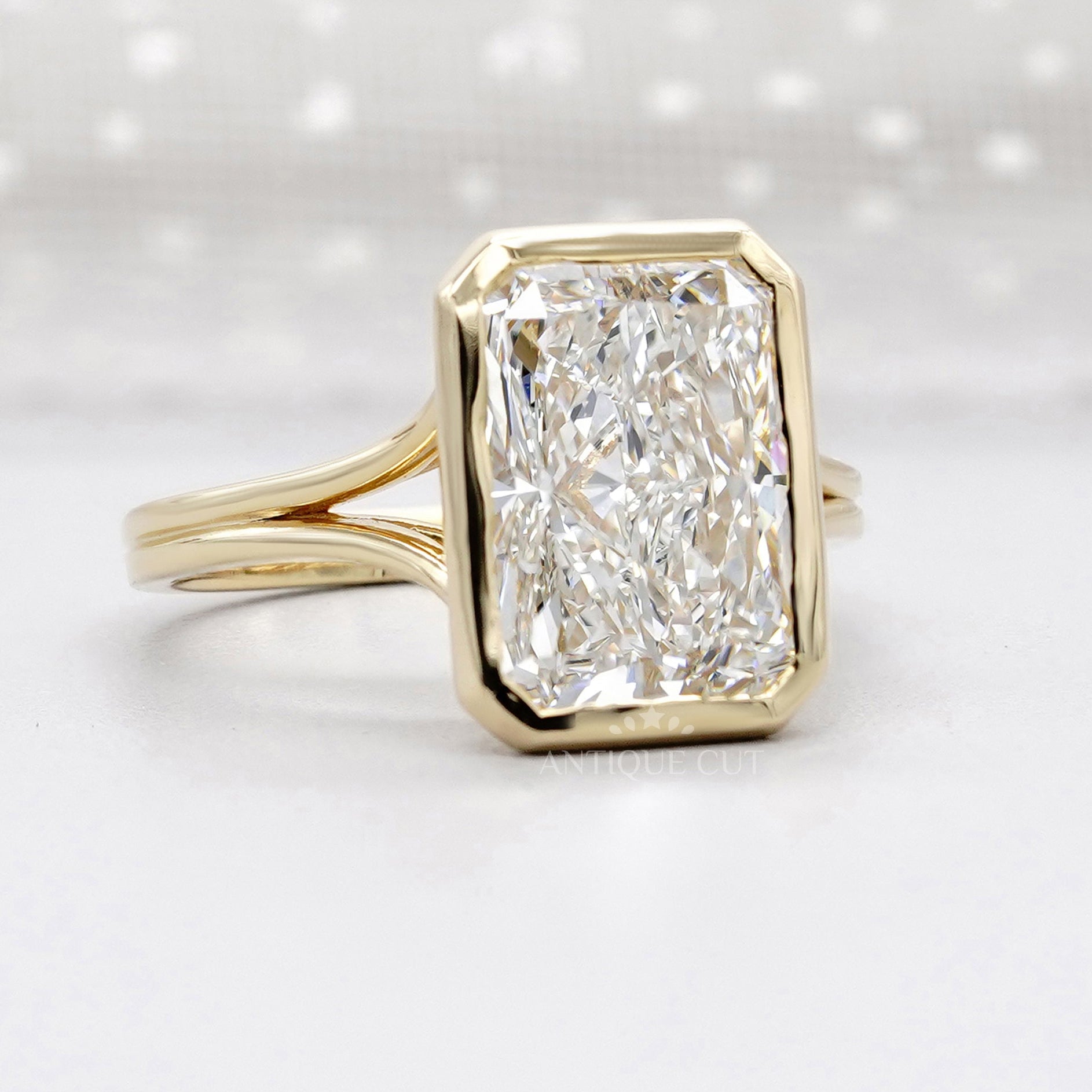 Antiquecut radiant cut bezel set ring