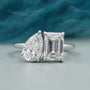Toi et Moi engagement ring with emerald and pear diamond in white gold