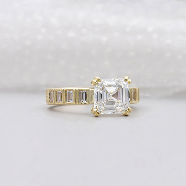 Vintage inspired Asscher cut diamond ring with refined engagement style