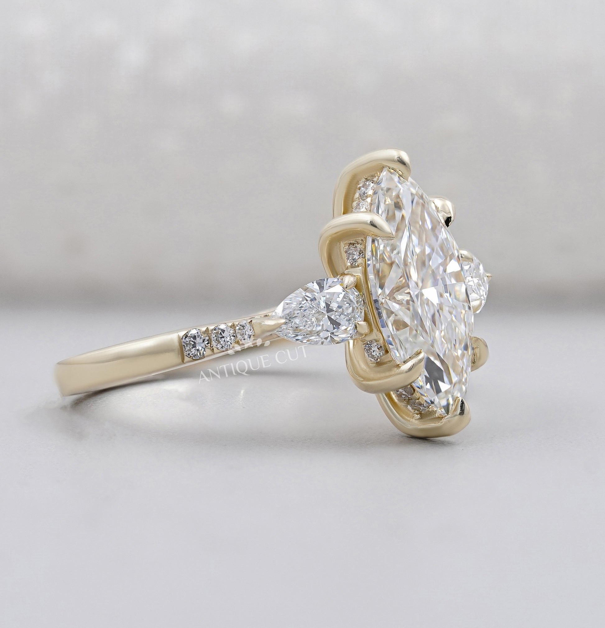 Marquise Cut Engagement Ring with Side Stones
