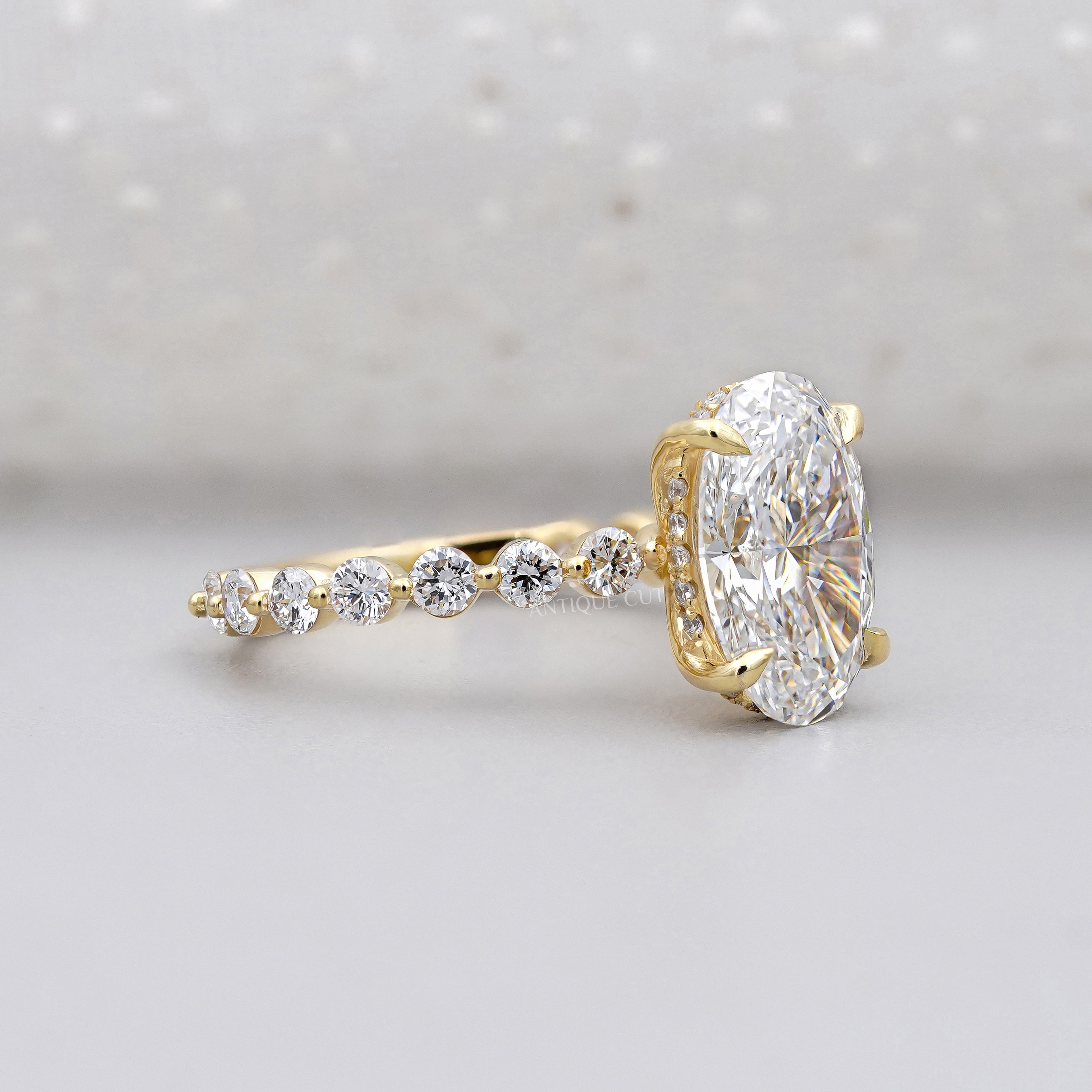 Lab grown oval diamond ring with claw prong setting
