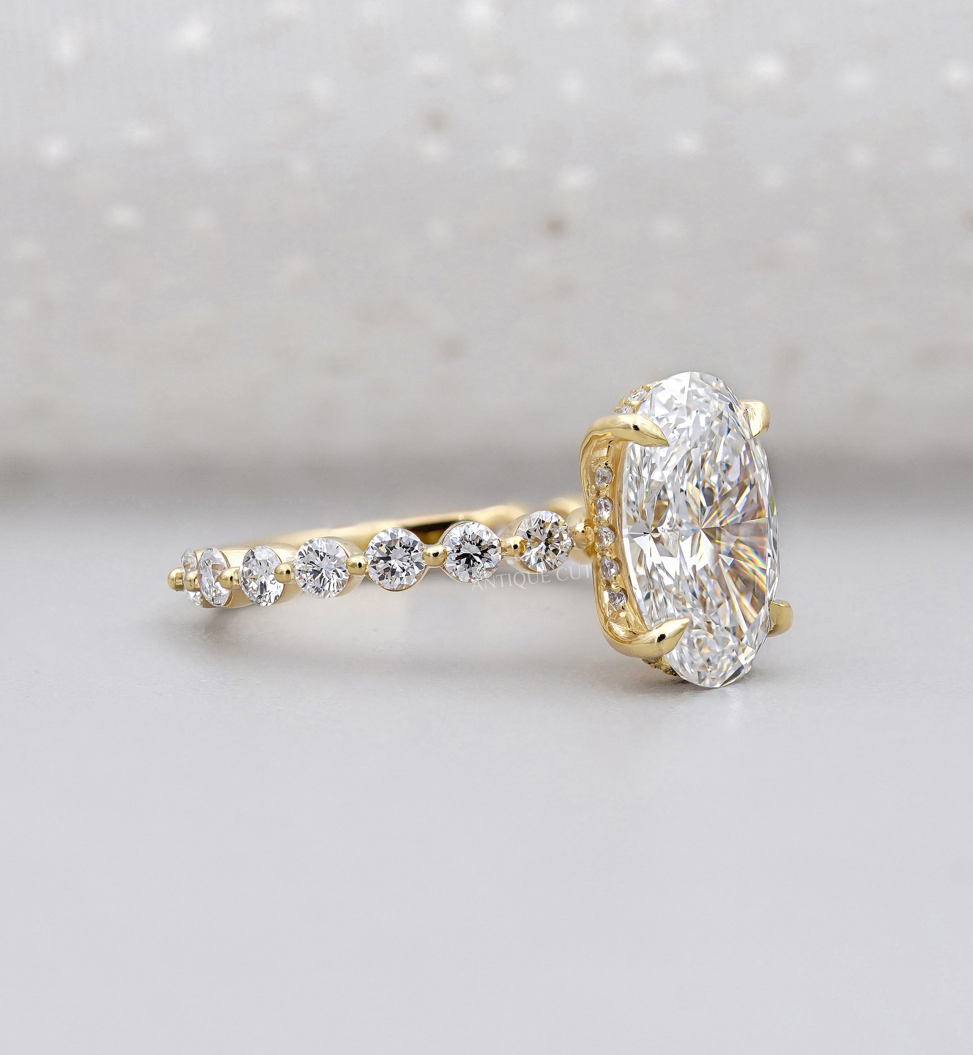 Lab grown oval diamond ring with claw prong setting