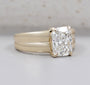 Yellow gold radiant diamond ring with bold double band design