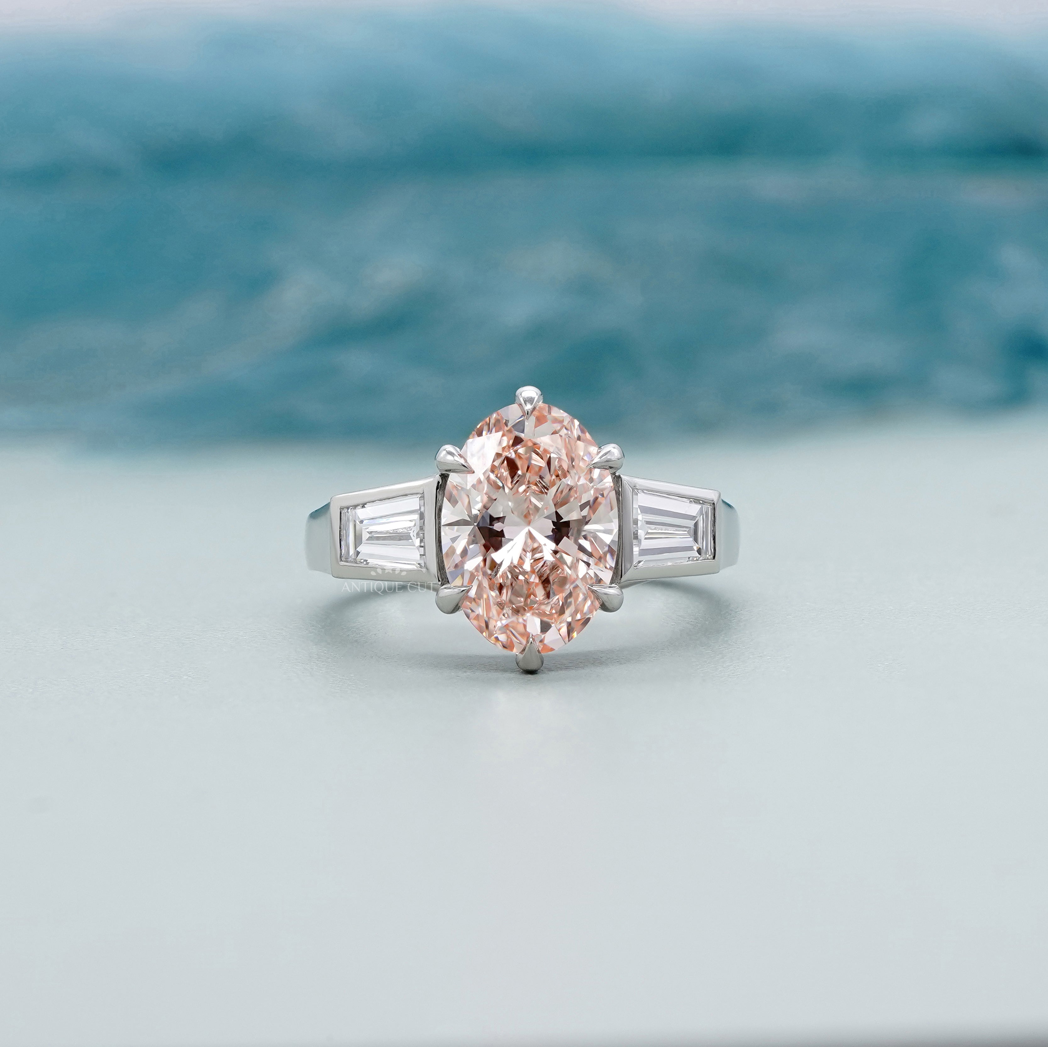Oval 3.80tcw Fancy Pink Lab Grown Diamond Three Stone Ring | IGI Certified