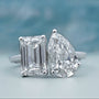 Toi Et Moi emerald and pear engagement ring in yellow gold