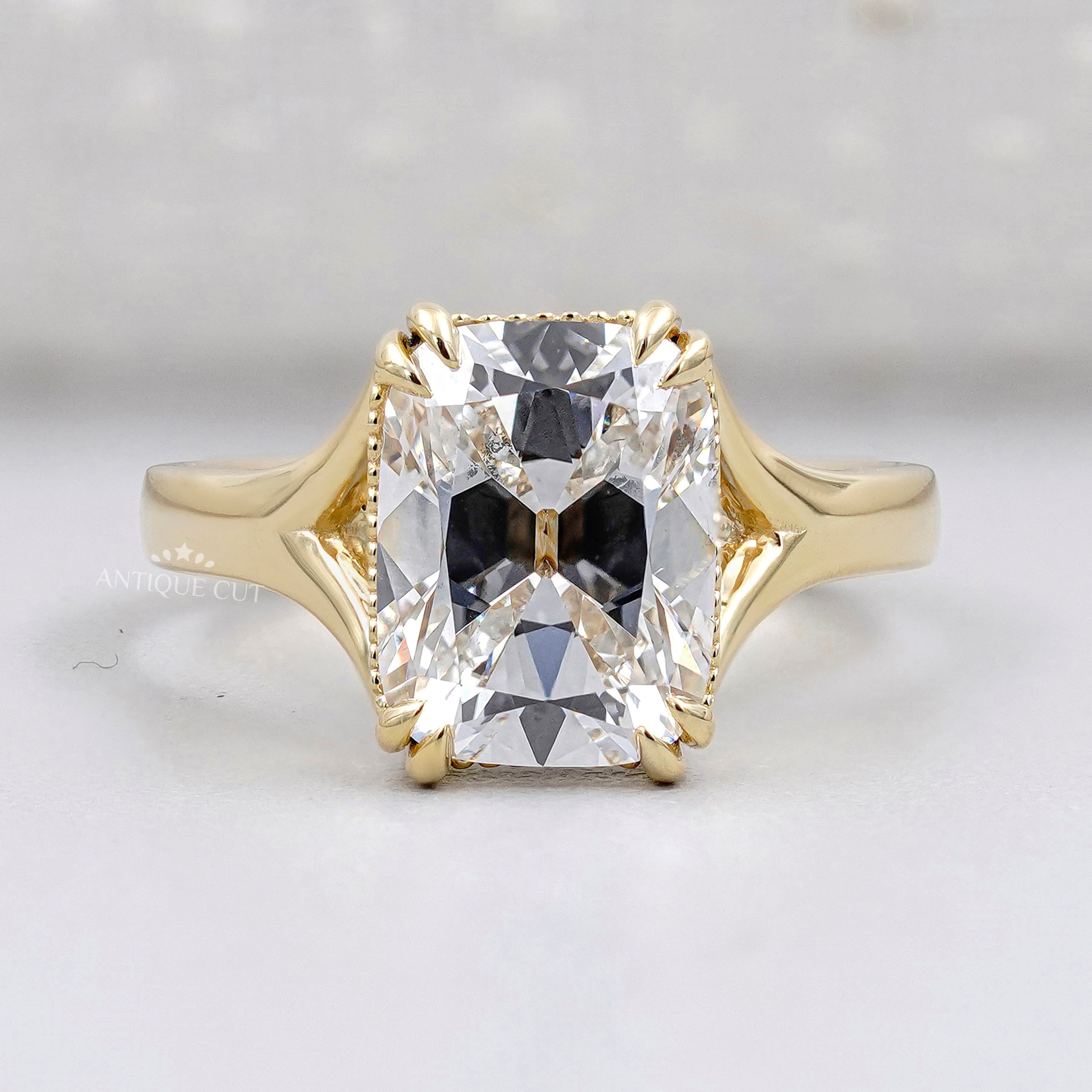 Radiant cut diamond engagement ring in yellow gold