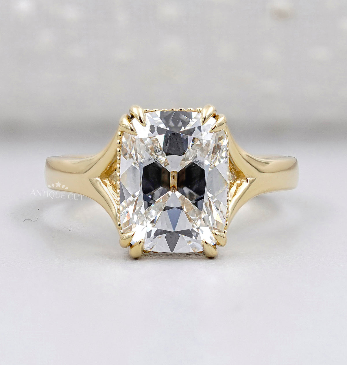 Radiant cut diamond engagement ring in yellow gold