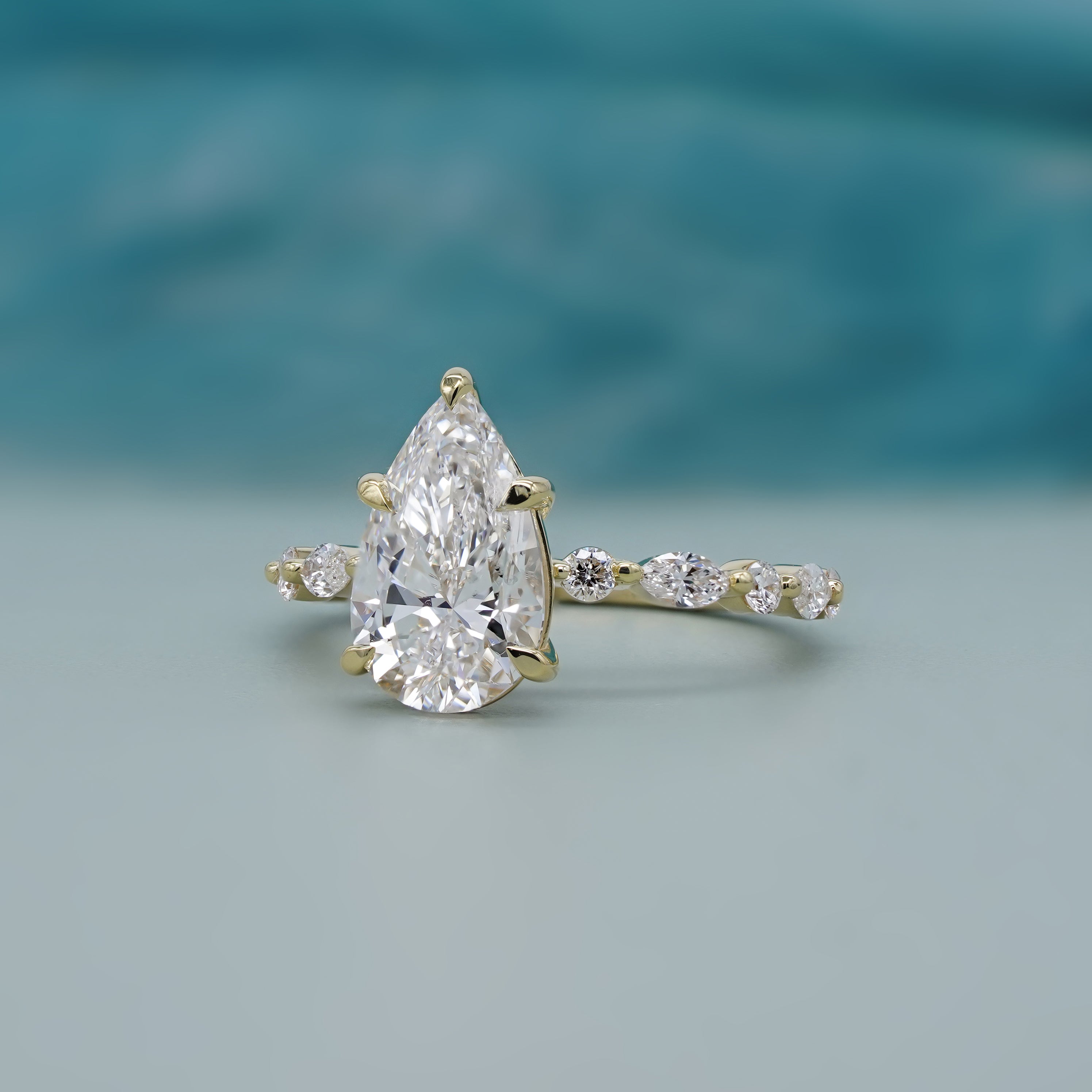Pear Lab Created Diamond Ring 4.85tcw | Accent Engagement Ring with Marquise and Round Band | IGI Certificate