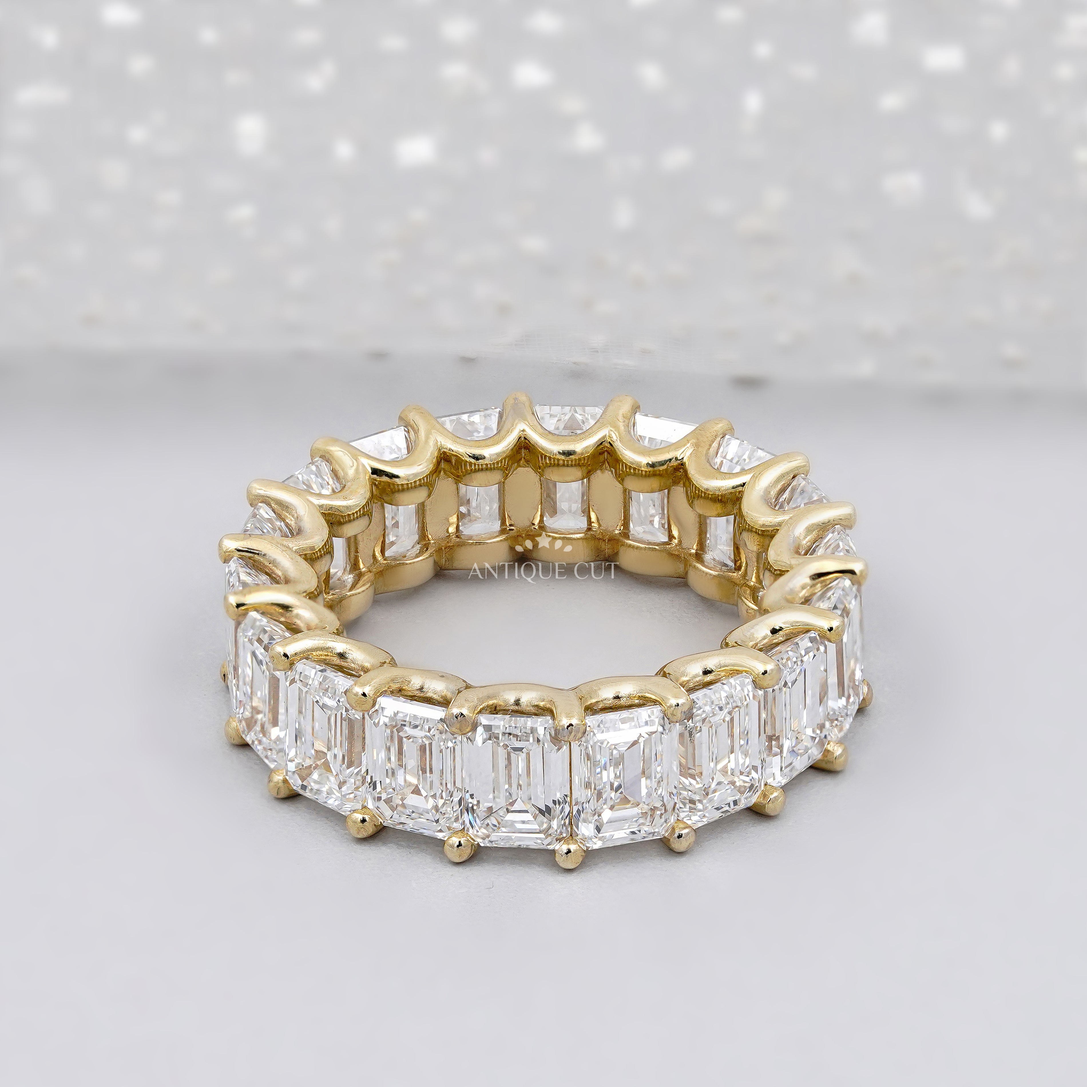 Yellow gold emerald cut eternity wedding band