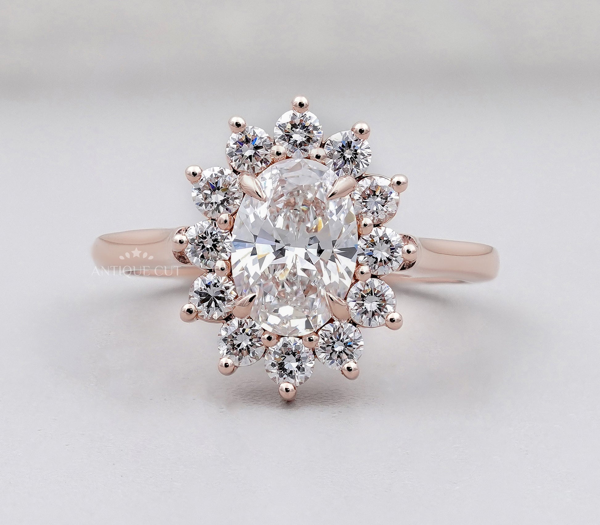 Oval Rose Gold Halo Engagement Ring With Floral Style Round Diamond Accent | IGI Certified