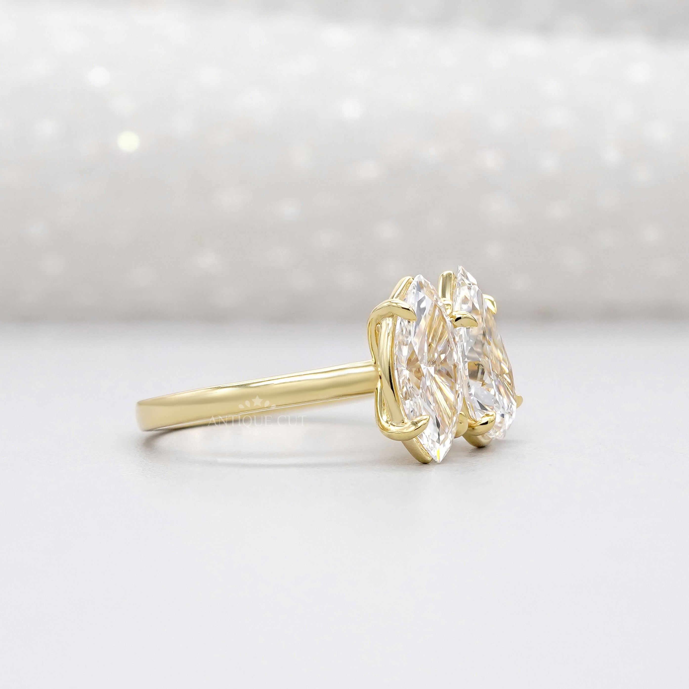 Marquise and pear lab grown diamond ring in yellow gold