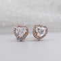 Close up of heart diamond stud earrings in rose gold