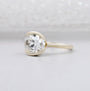 bezel set oval diamond ring yellow gold