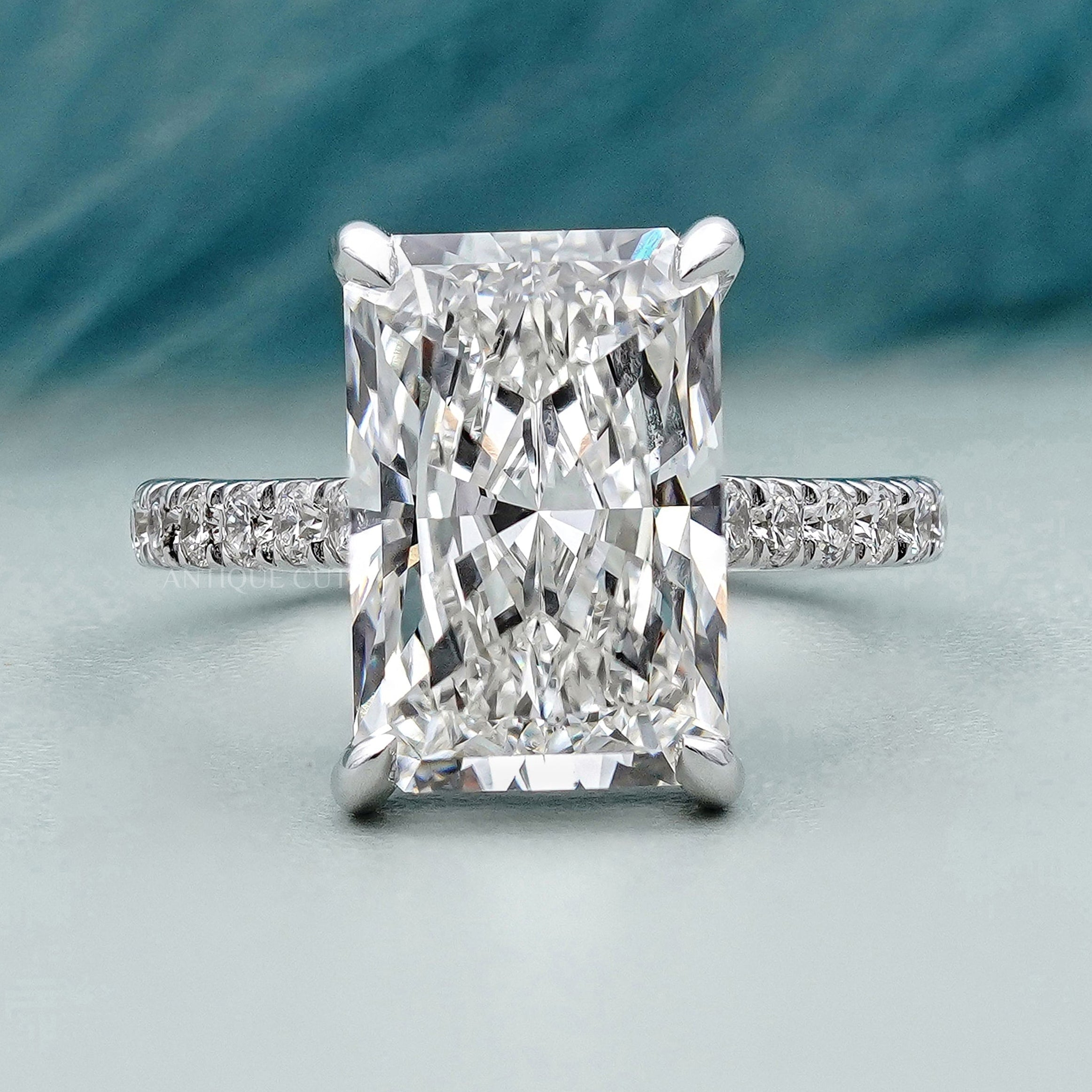 Hidden halo radiant engagement ring in white gold