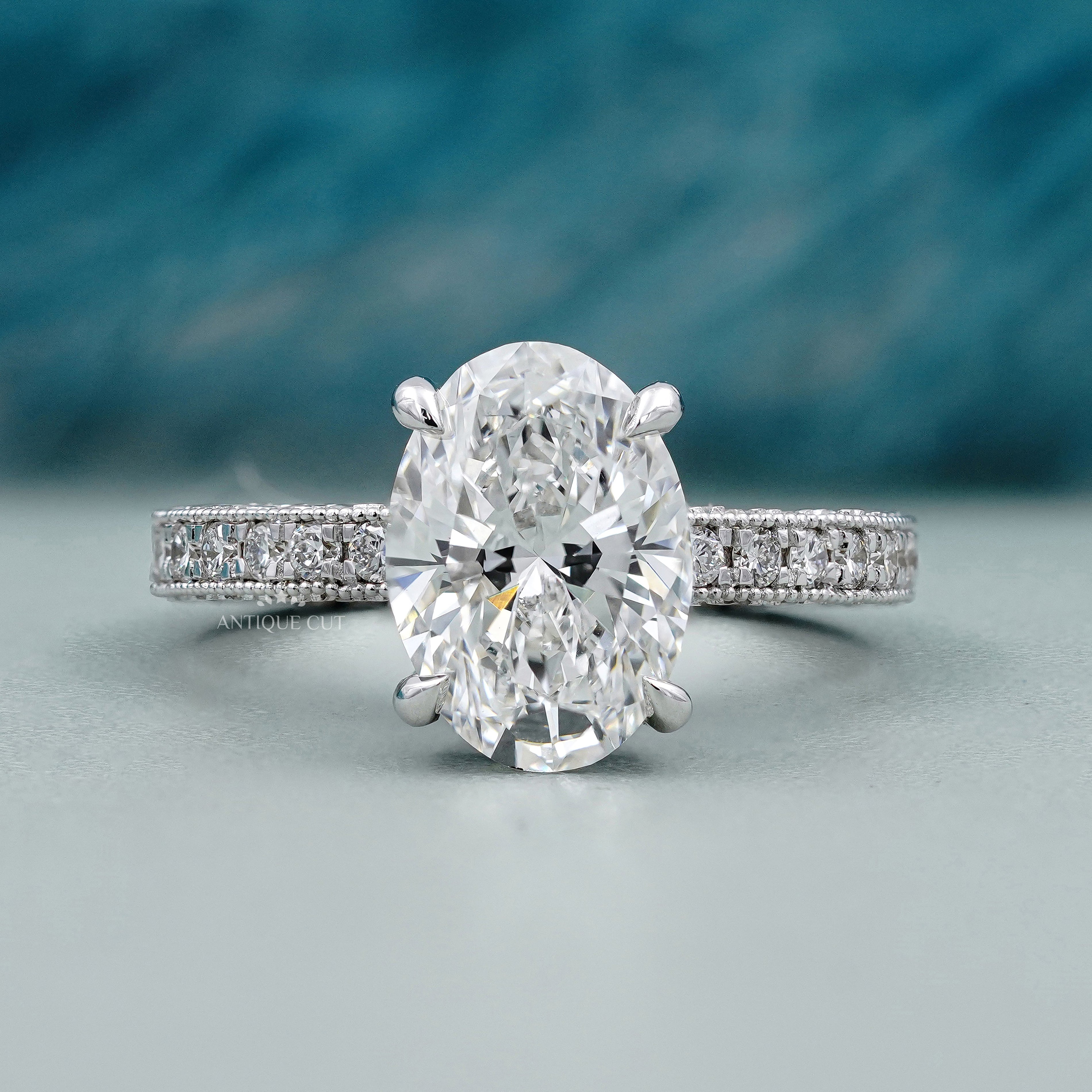 Oval Cut Engagement Ring with Pave Diamond Band | Hidden Halo White Gold