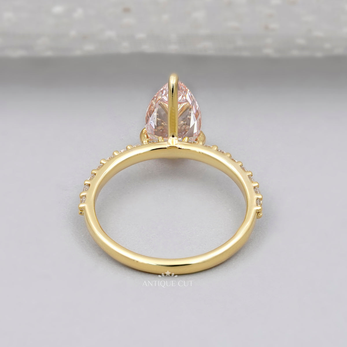 IGI certified pink diamond ring with yellow gold setting