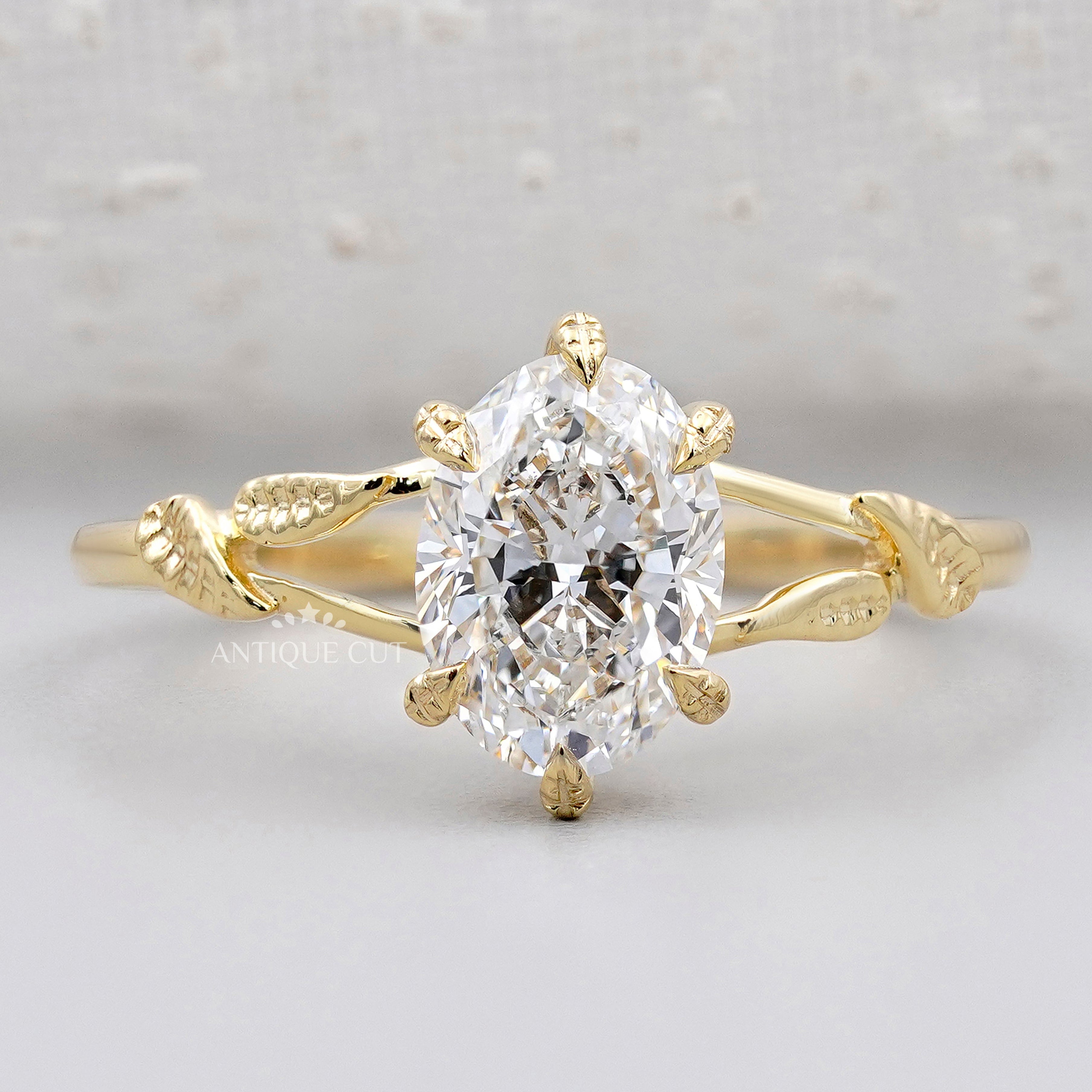 Vintage inspired floral leaf oval solitaire ring