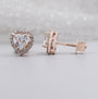 Rose gold halo diamond stud earrings with heart cut center