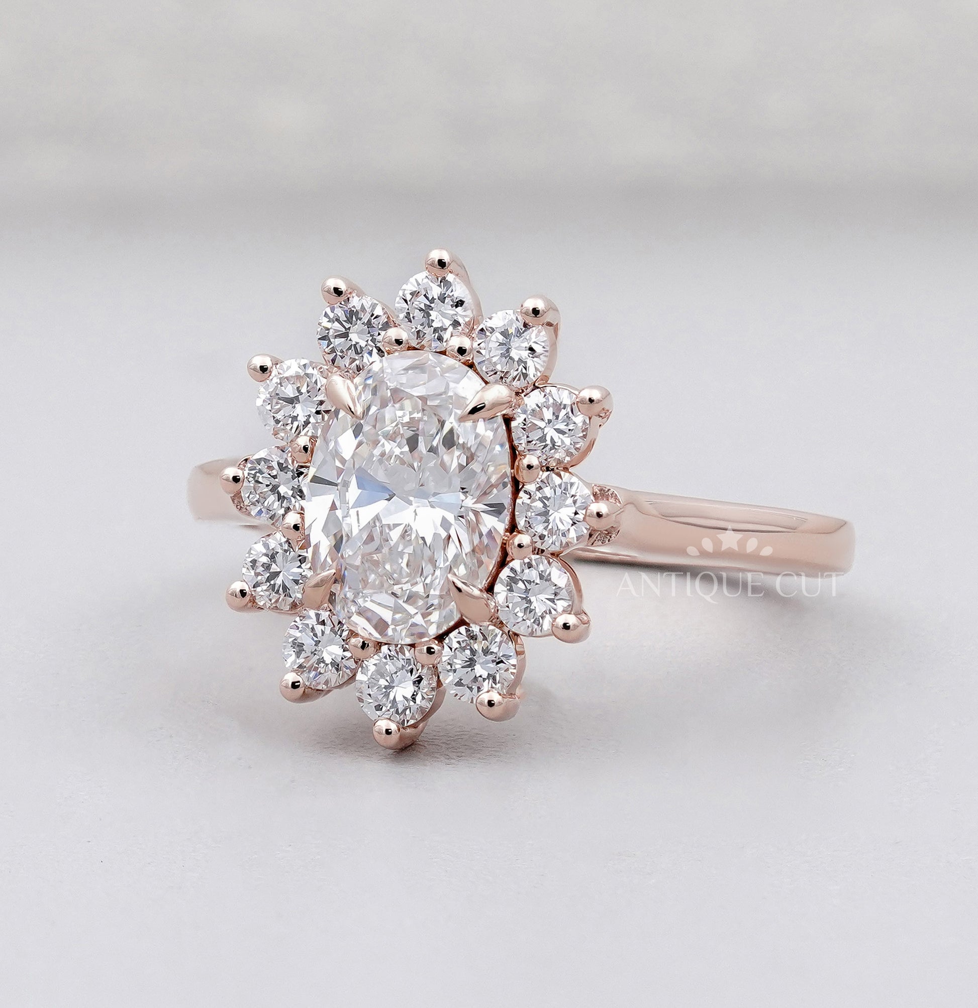 Oval Rose Gold Halo Engagement Ring With Floral Style Round Diamond Accent | IGI Certified