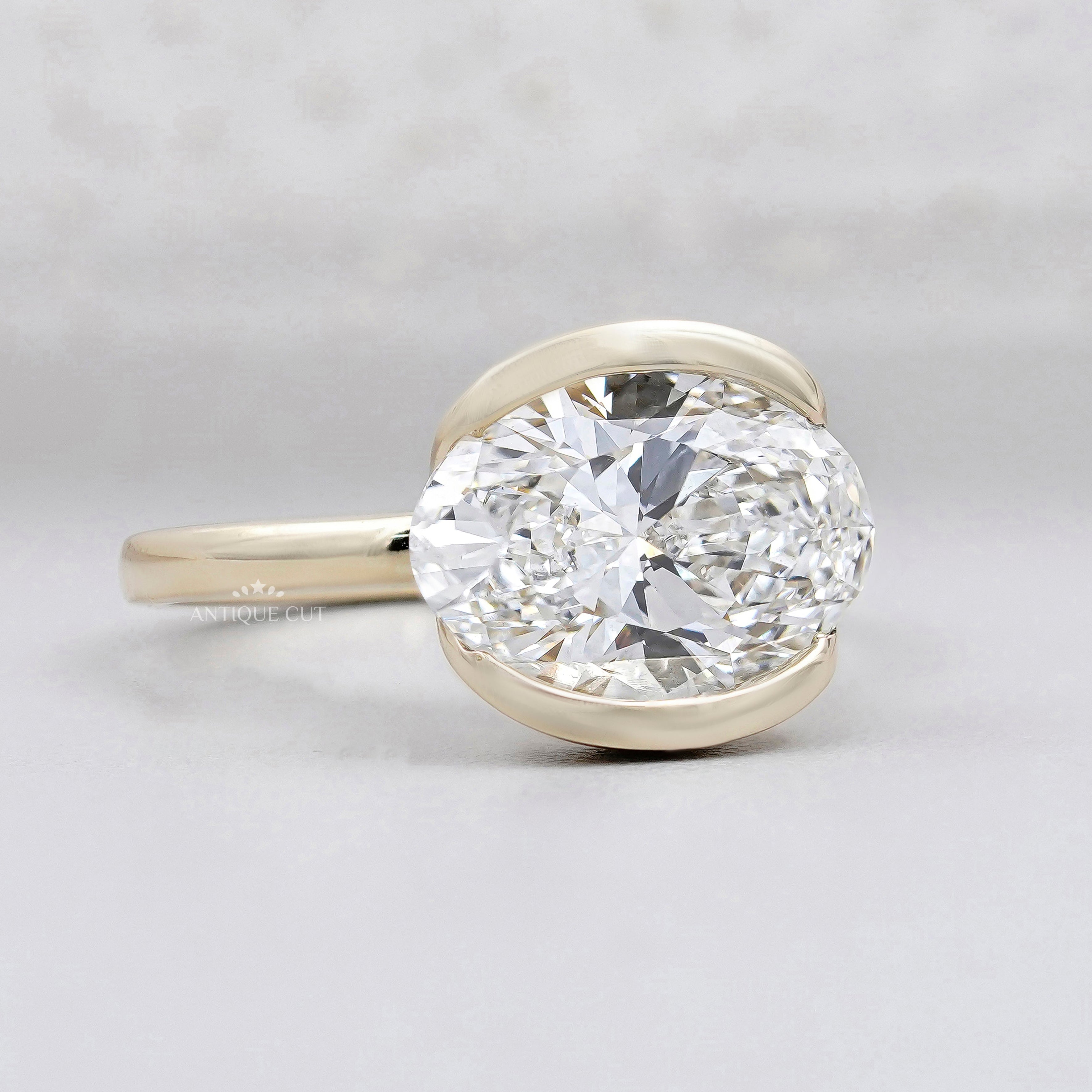 oval solitaire diamond ring horizontal setting