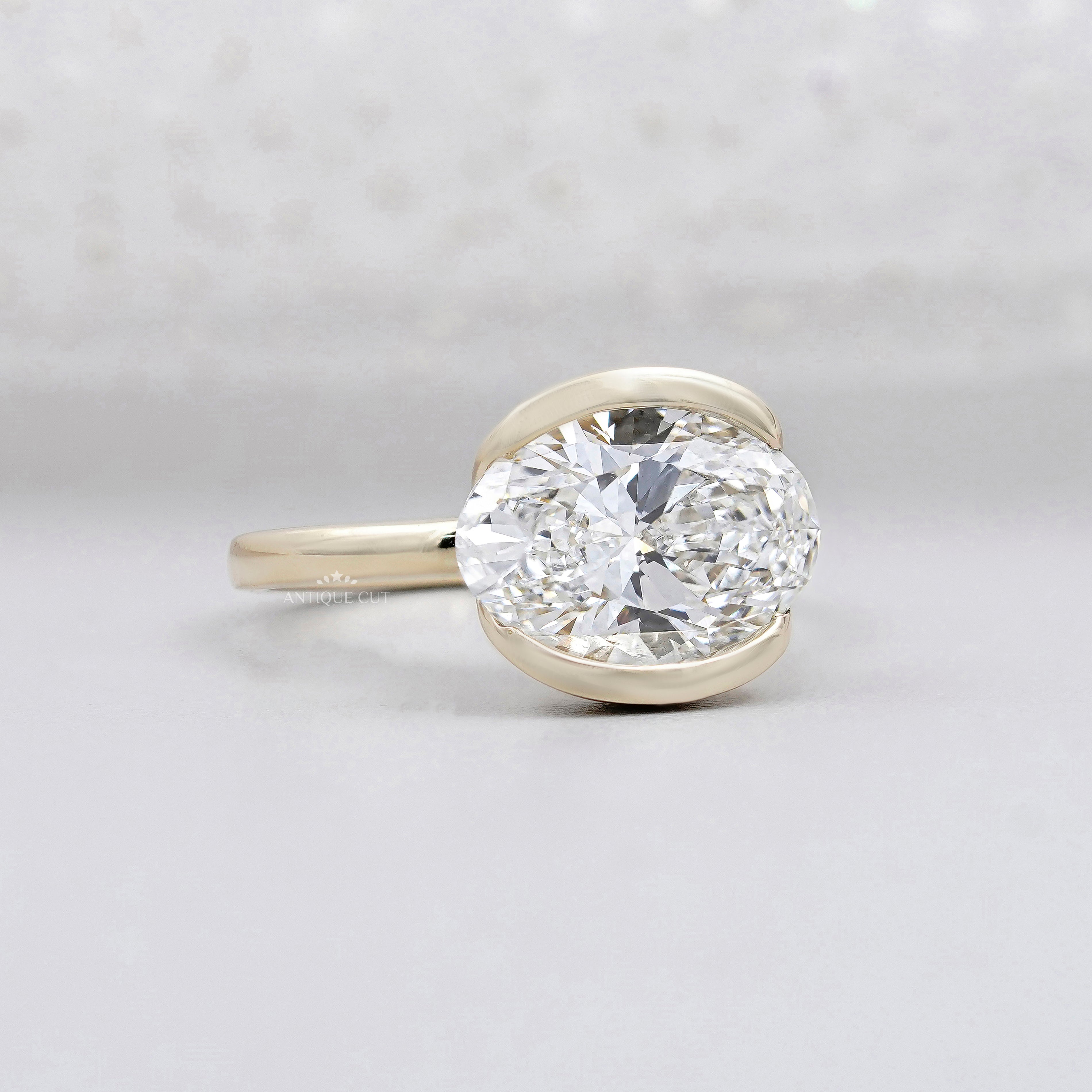 oval solitaire diamond ring horizontal setting