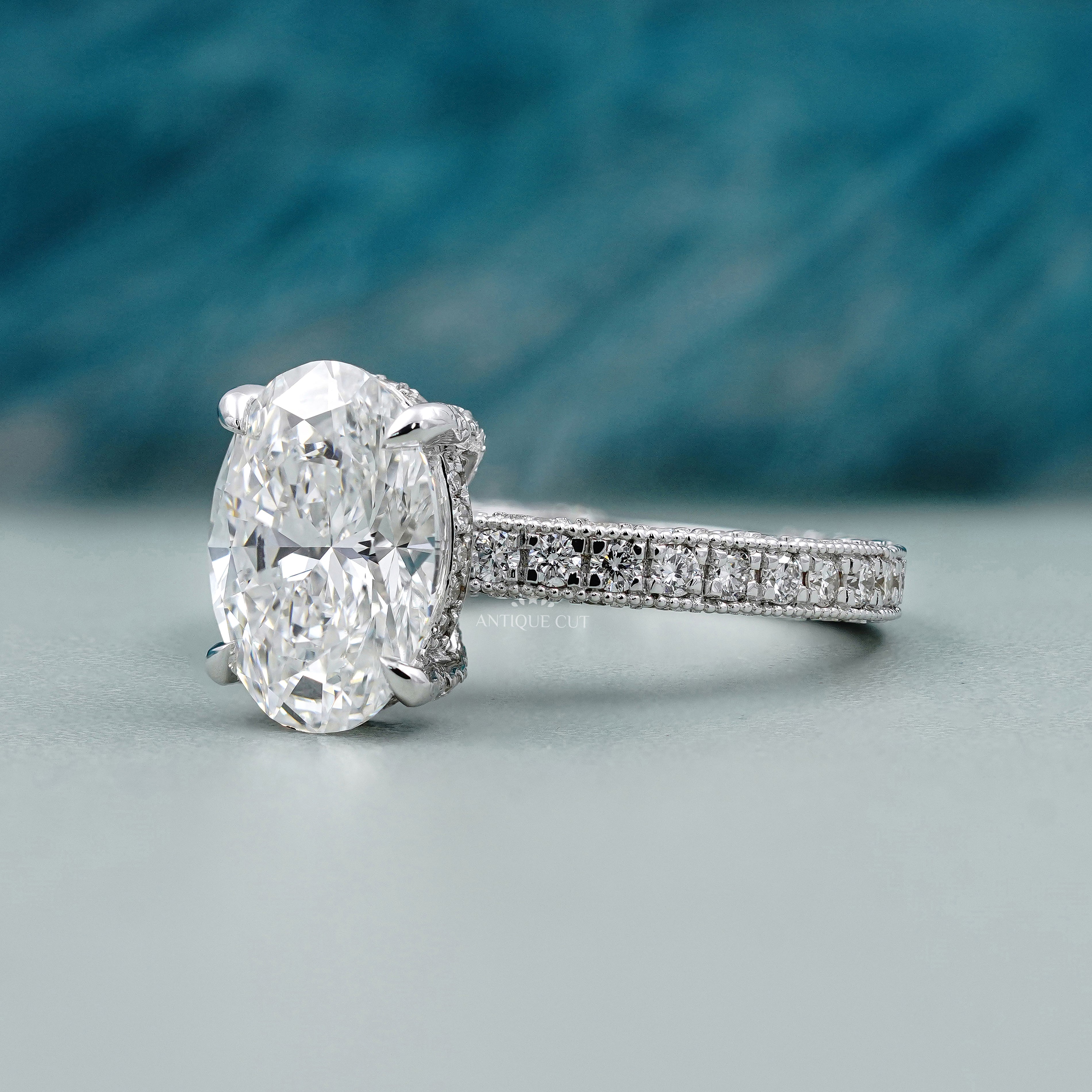 Oval Cut Engagement Ring with Pave Diamond Band | Hidden Halo White Gold