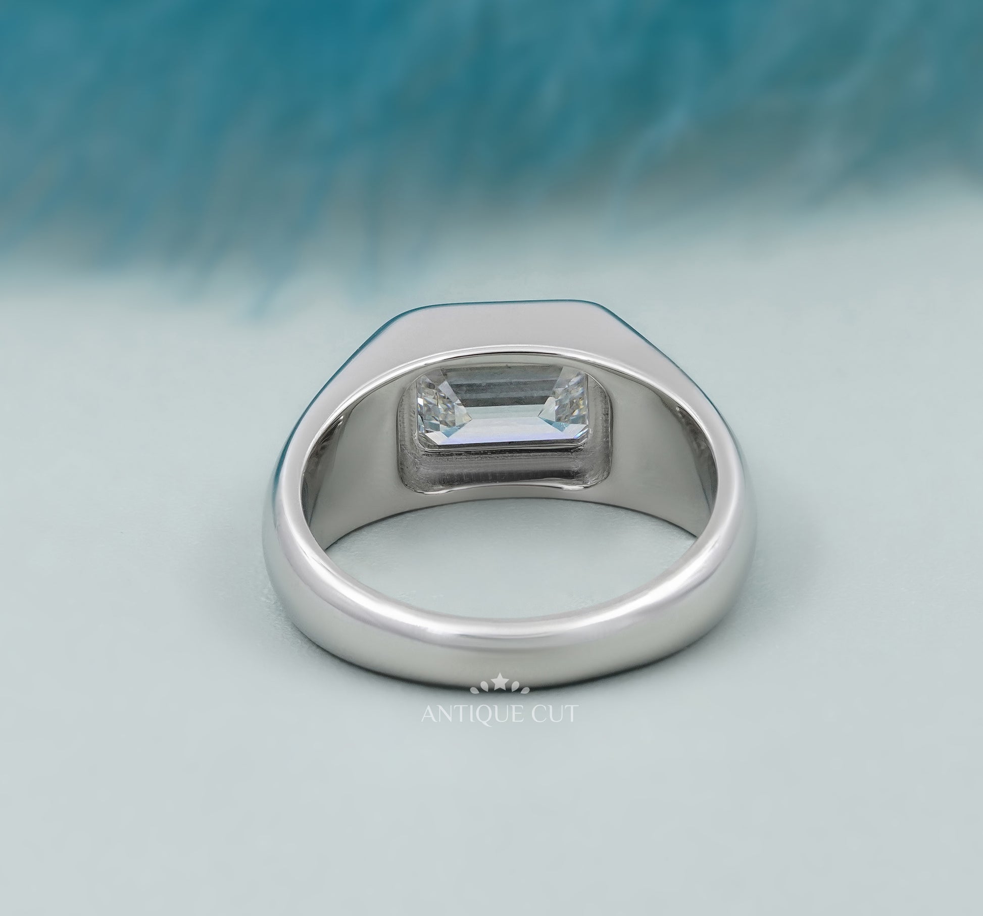 Emerald Cut East West Engagement Ring