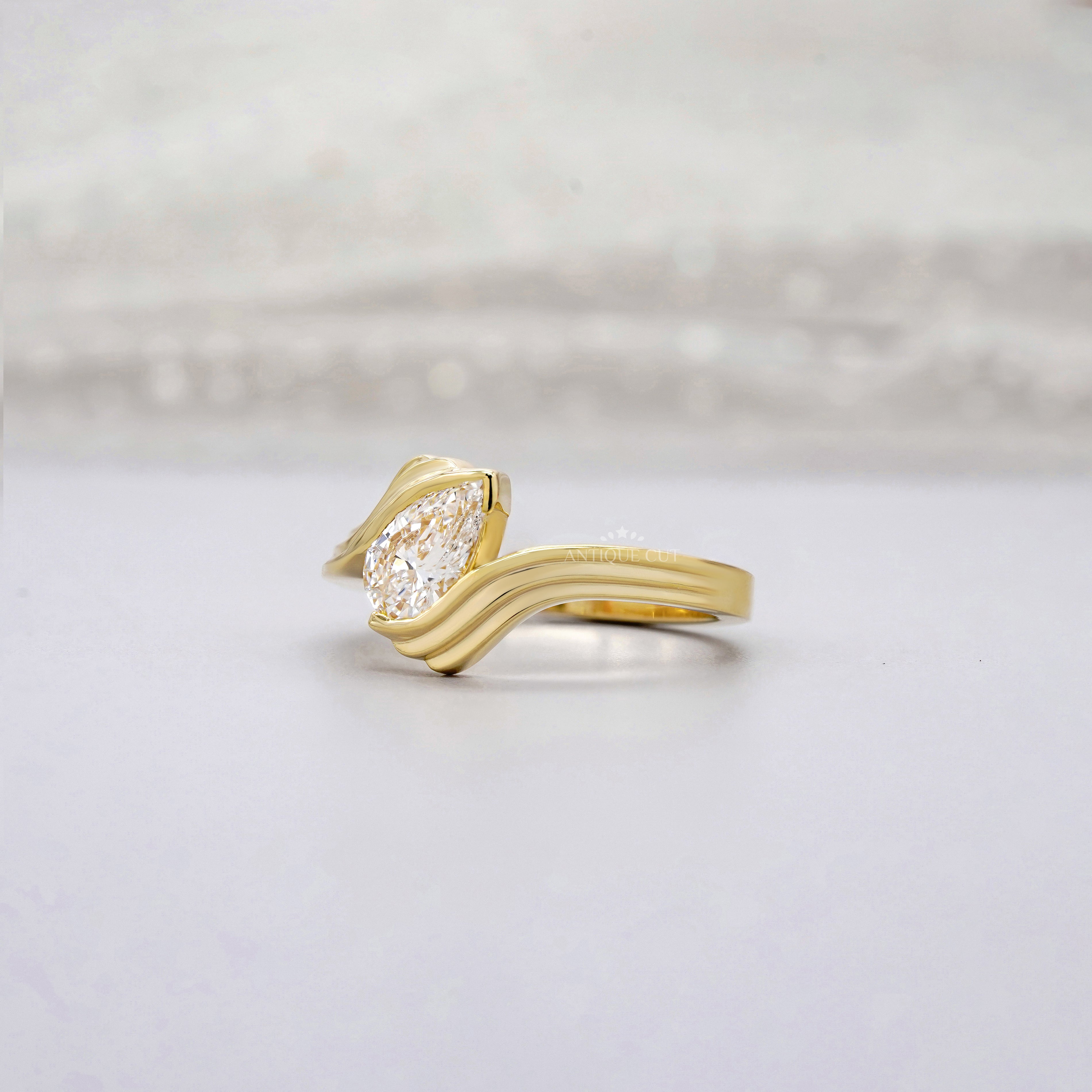 1.00ct Pear Lab Diamond Wave Solitaire Ring | Sculpted Yellow Gold | IGI Certified