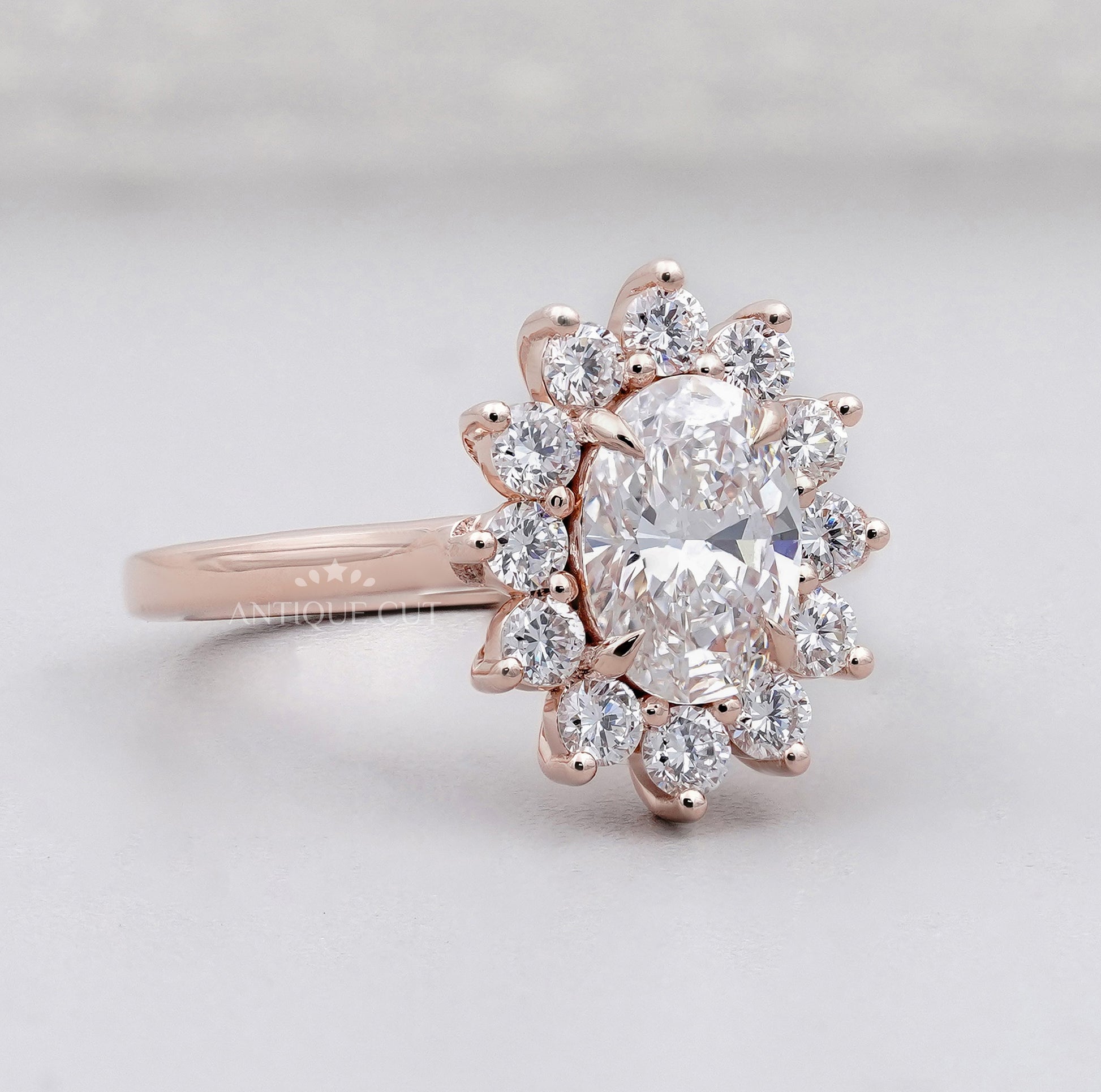 Oval Rose Gold Halo Engagement Ring With Floral Style Round Diamond Accent | IGI Certified