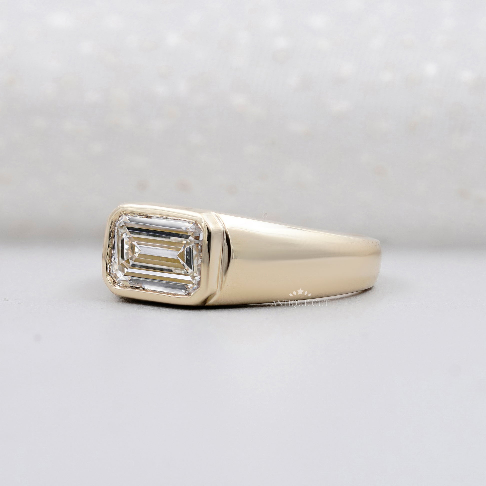 minimalist emerald cut engagement ring