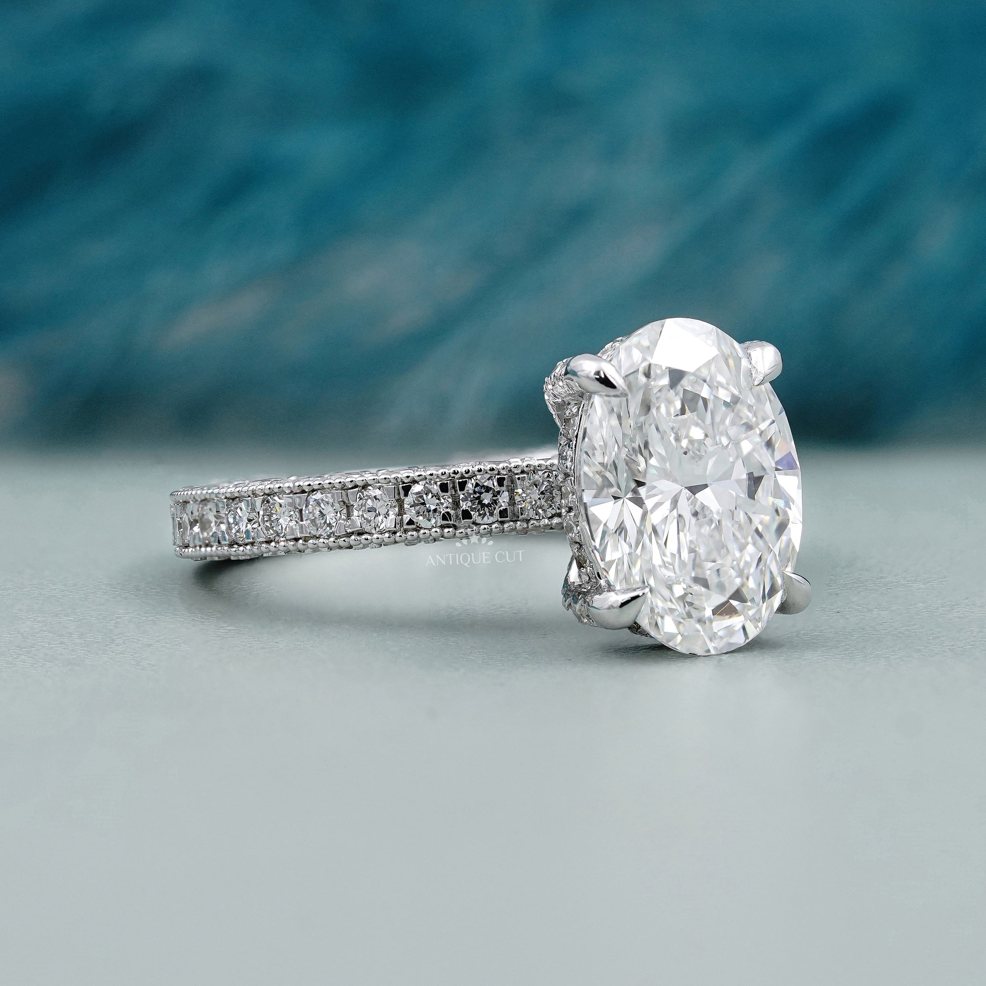 Hidden Halo Oval Diamond Ring with Pave Band