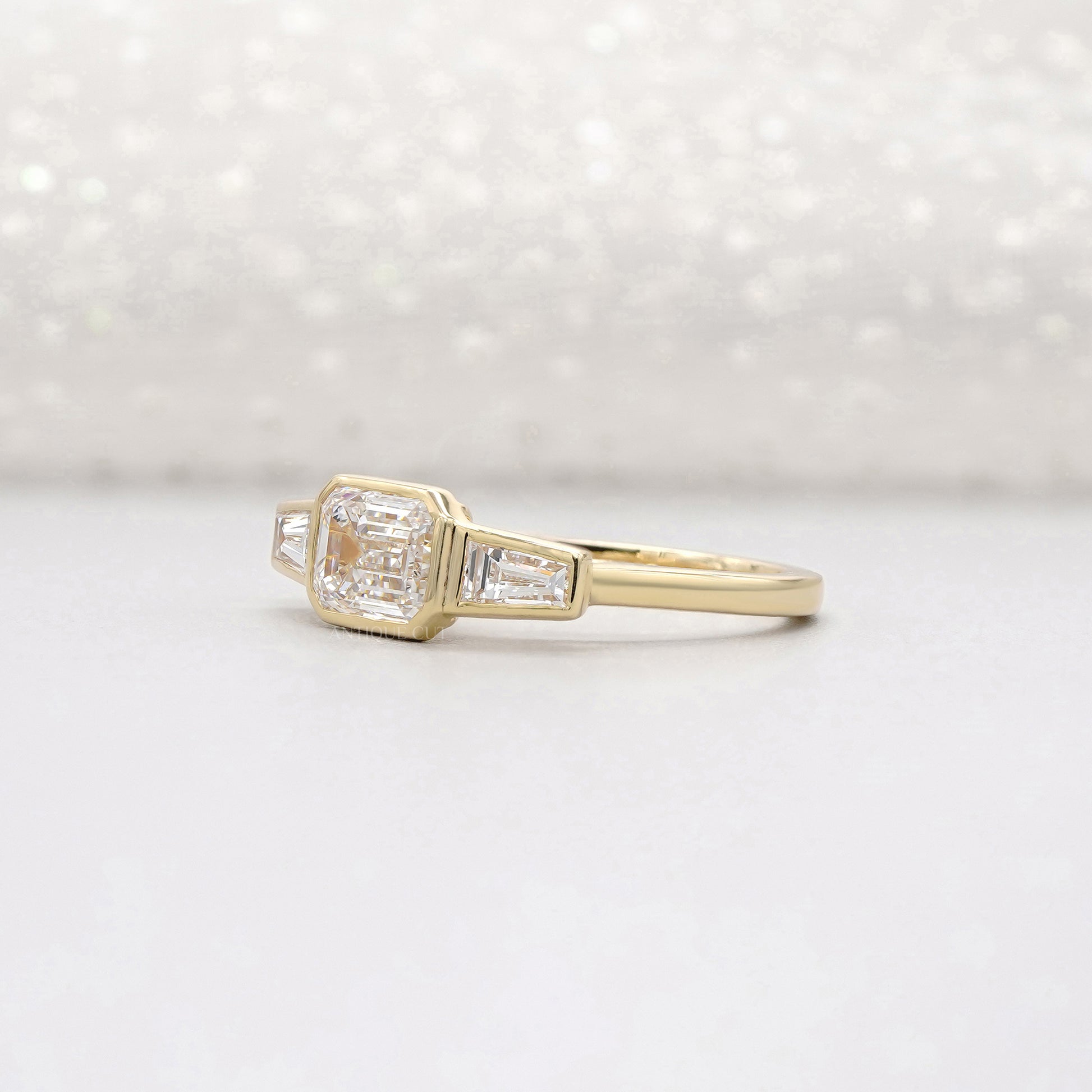 Emerald 2.20tcw Lab Grown Diamond Three Stone Engagement Ring in Yellow Gold