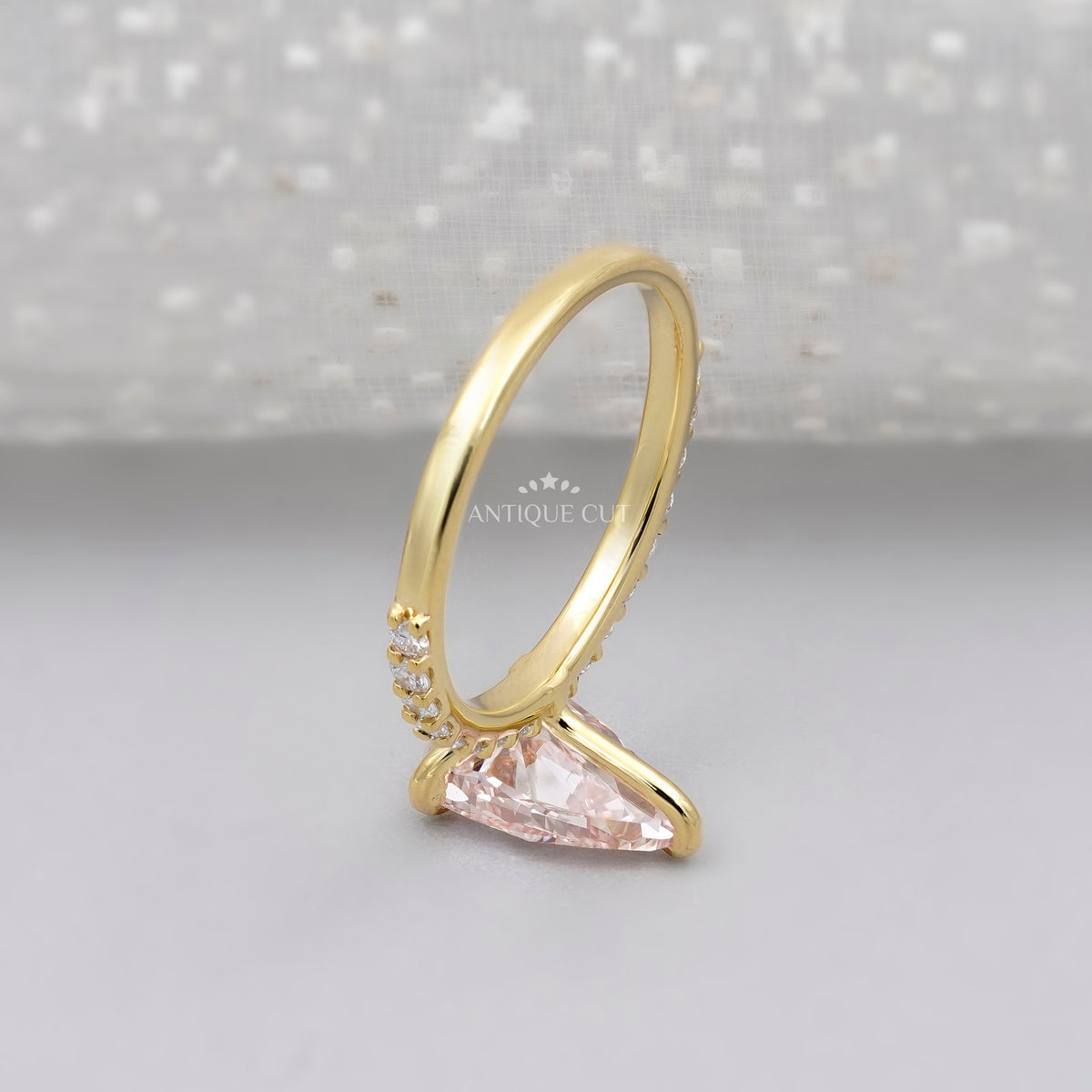 Elegant pear cut pink diamond bridal ring design
