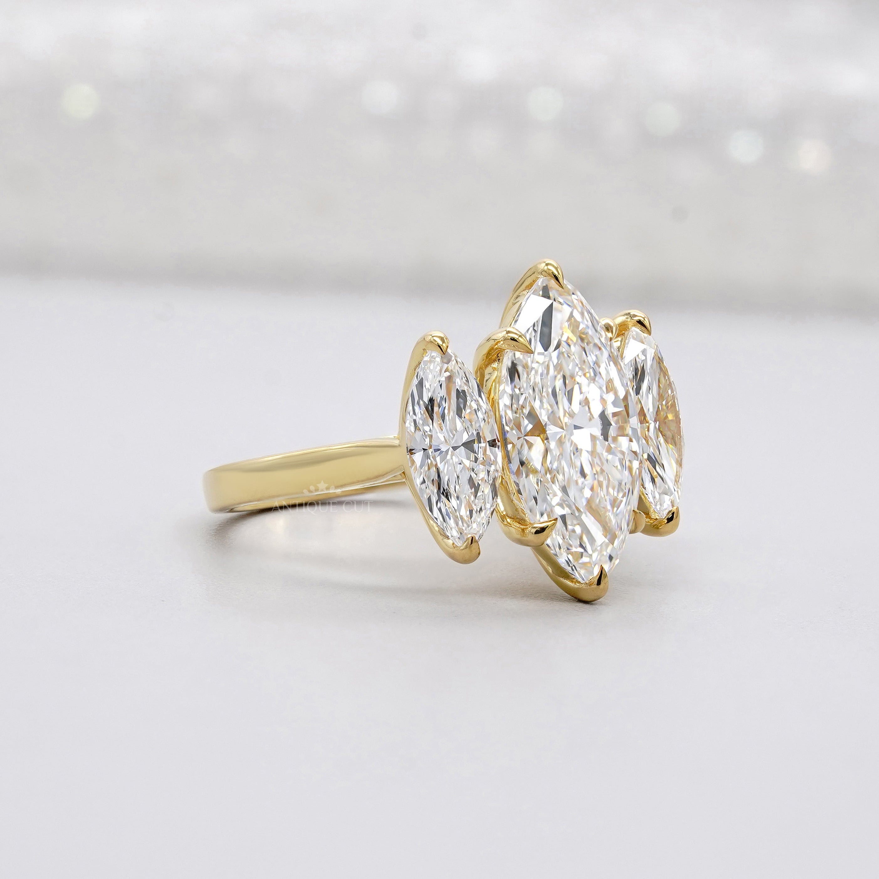 Elegant marquise diamond ring with side stones