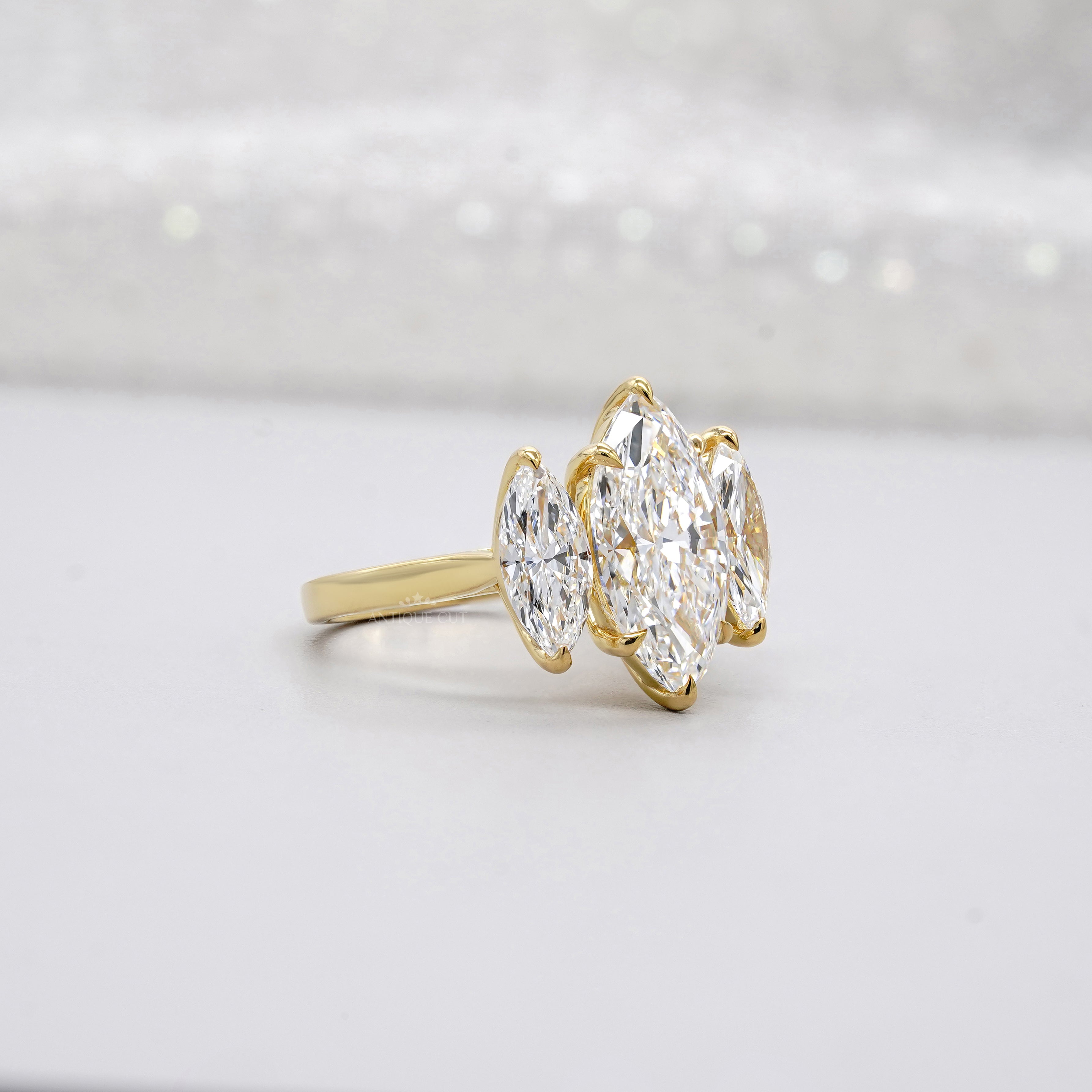 Elegant marquise diamond ring with side stones