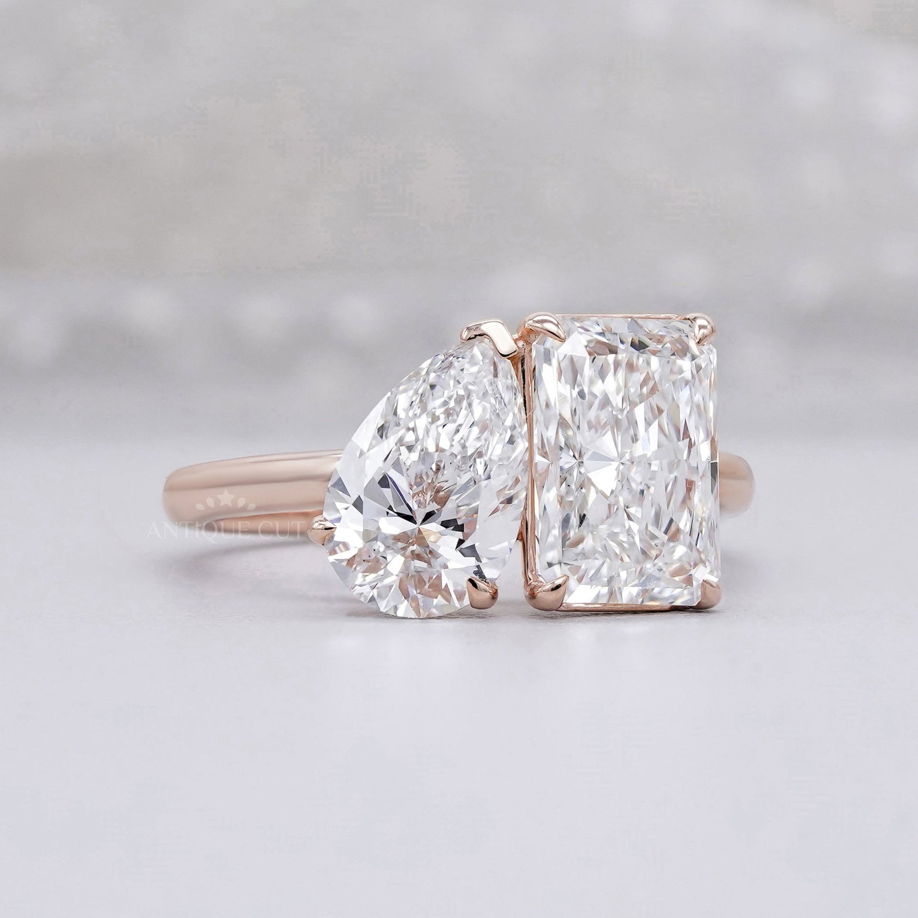Elegant pear and radiant diamond ring design