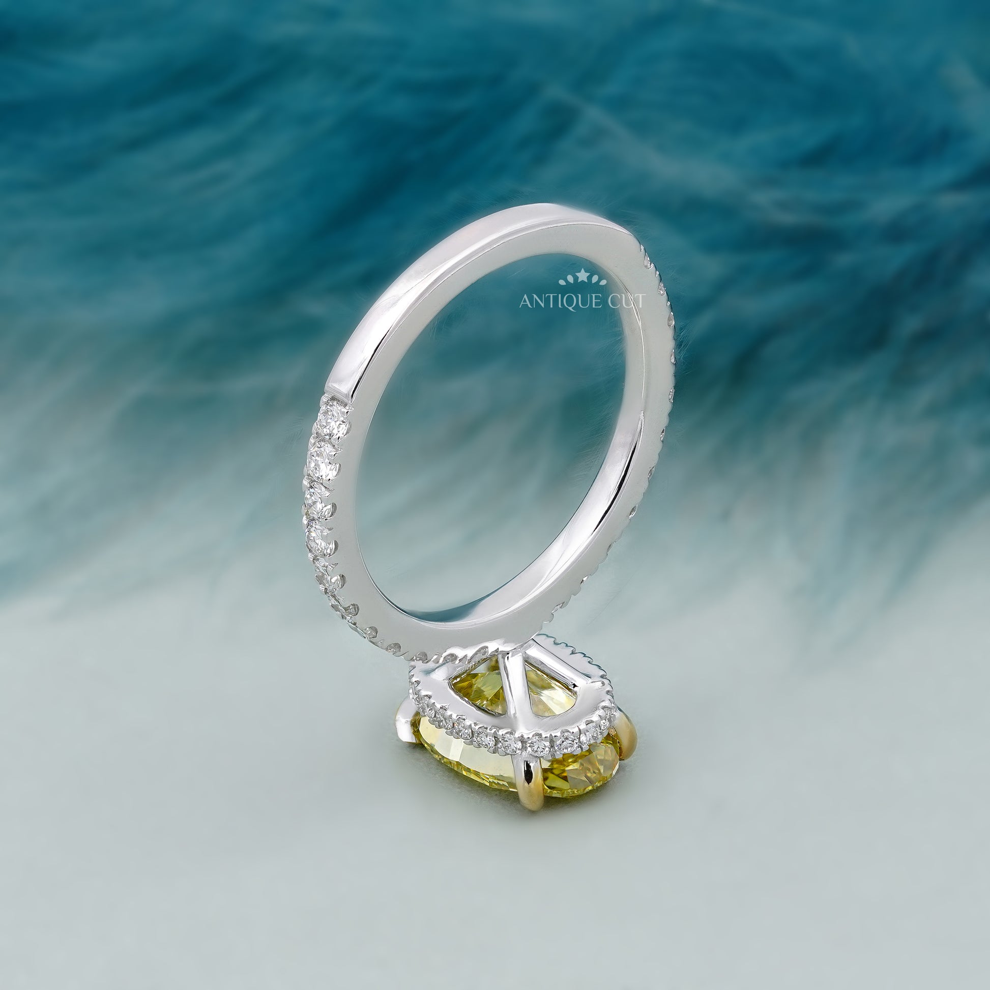Diamond ring with a yellow gemstone