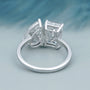 Elegant emerald and pear diamond ring design