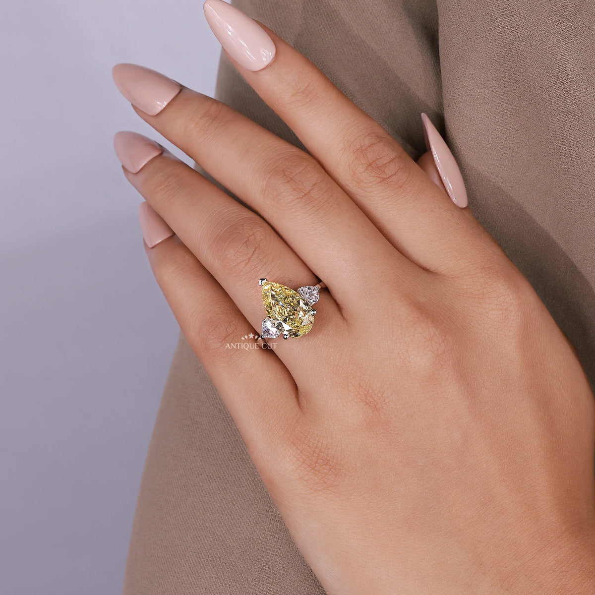 IGI certified three stone pear engagement ring