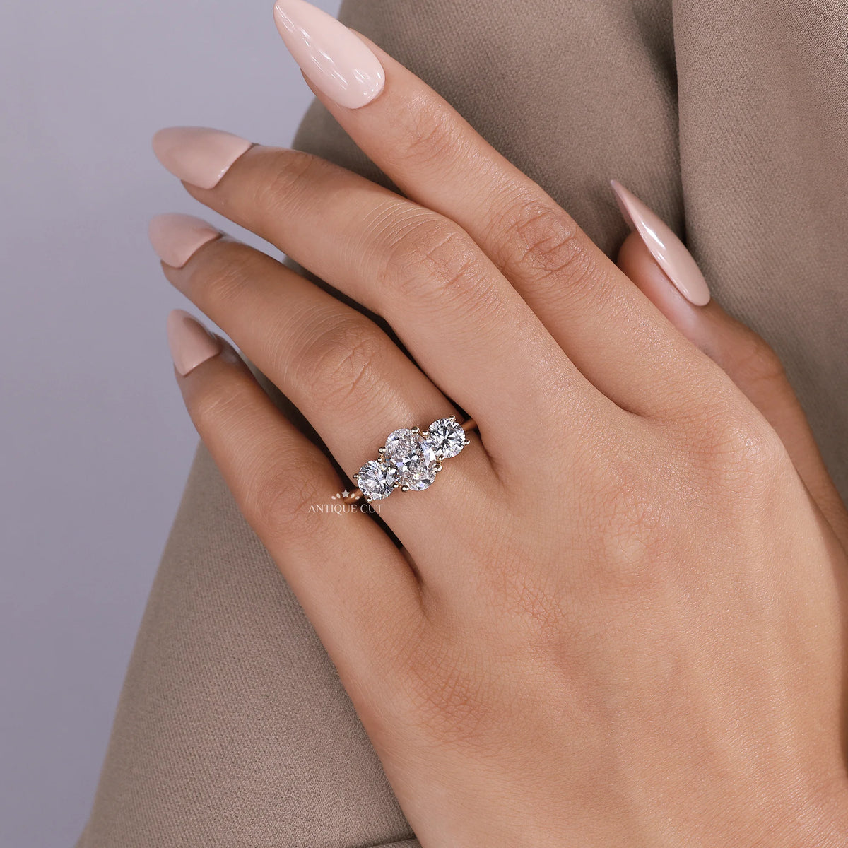 1.50 Carat Lab Grown Oval Cut Center Diamond & Two Round Side Stones With Trellis Gallery Setting