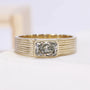 1.50 carat emerald shape diamond engagement ring in yellow gold
