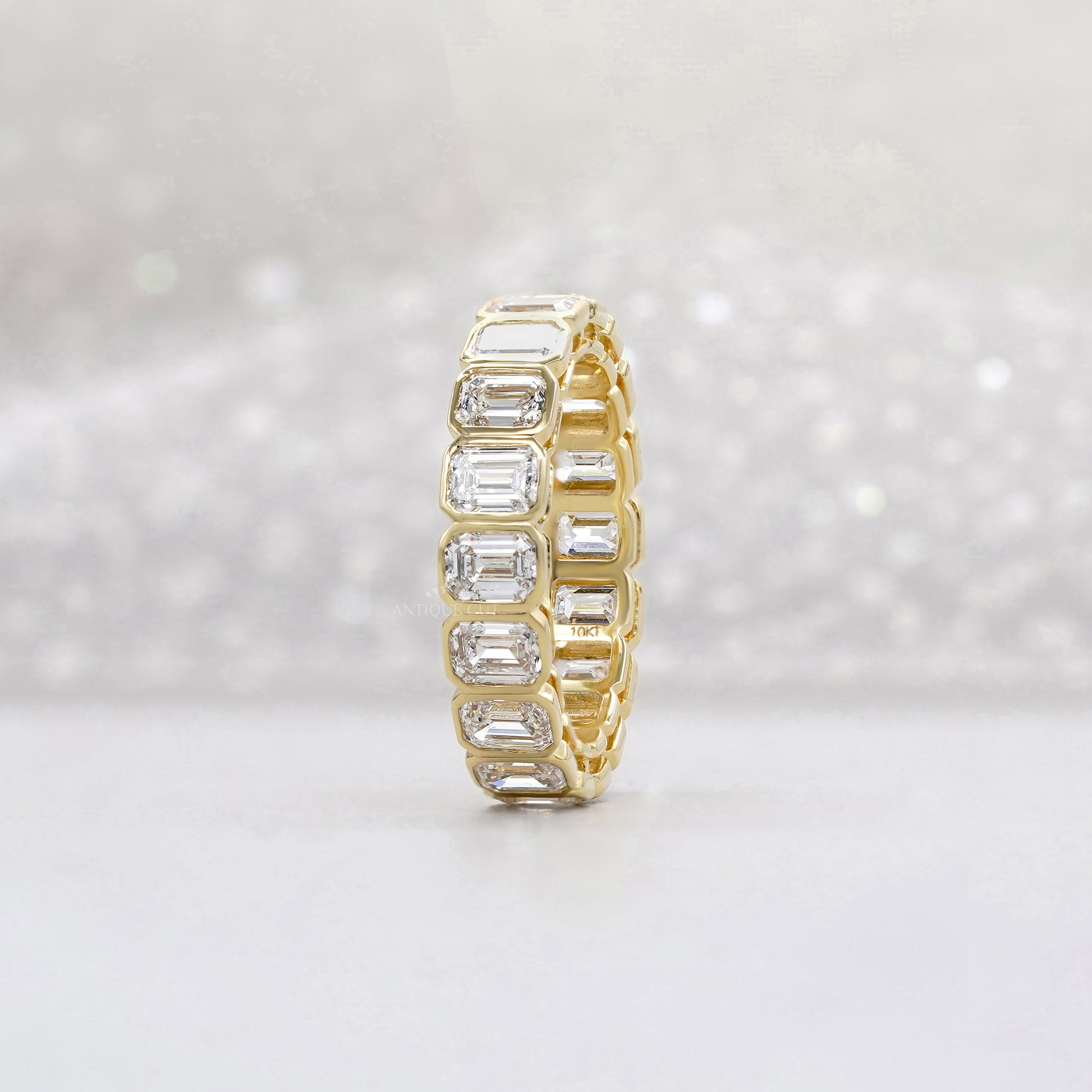 Emerald Cut 3.60tcw Lab Diamond Eternity Band | IGI Certified | Yellow Gold