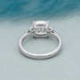 Cushion cut diamond ring with side stones