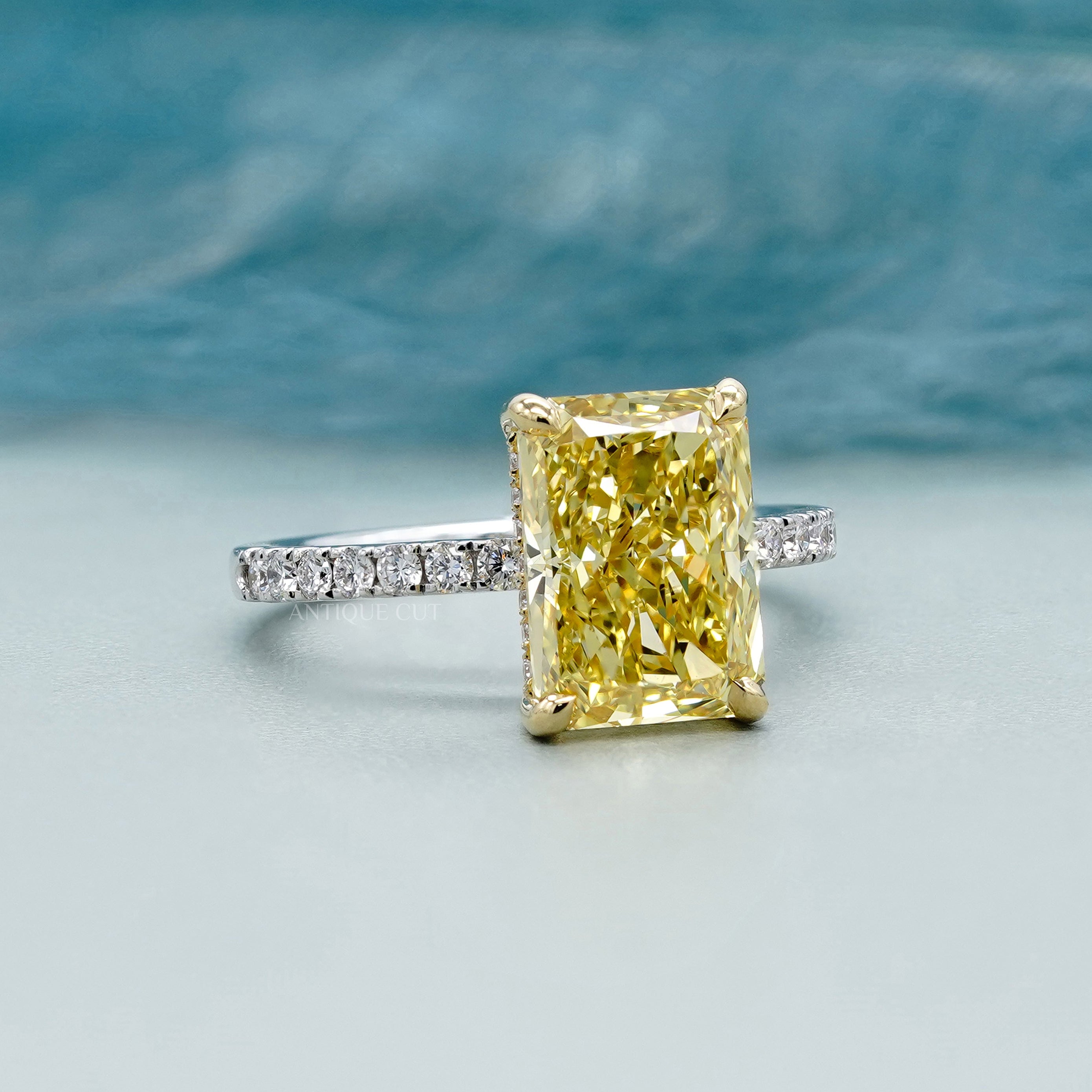 IGI certified yellow radiant cut diamond ring hidden halo