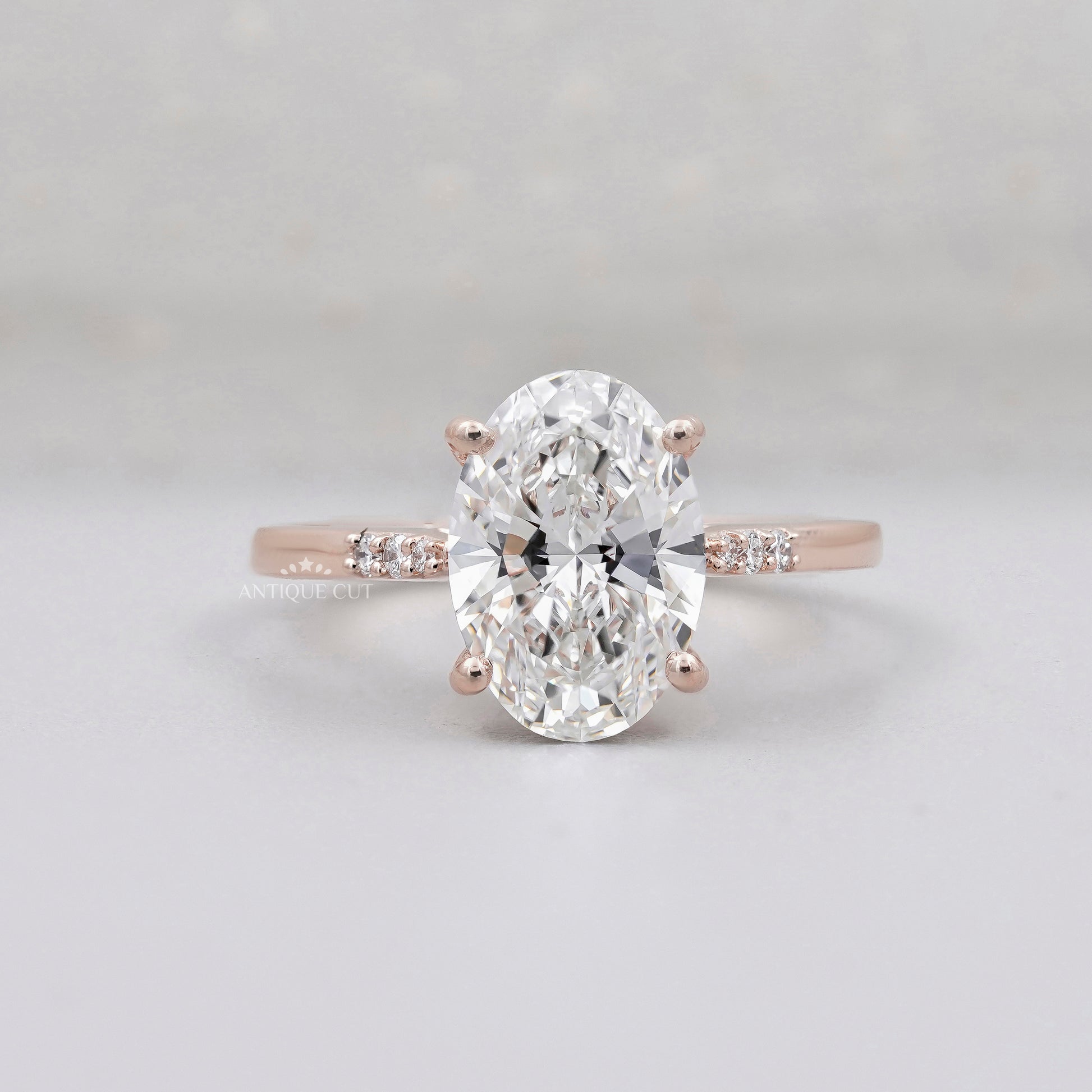 Oval diamond engagement ring rose gold pave band lab grown