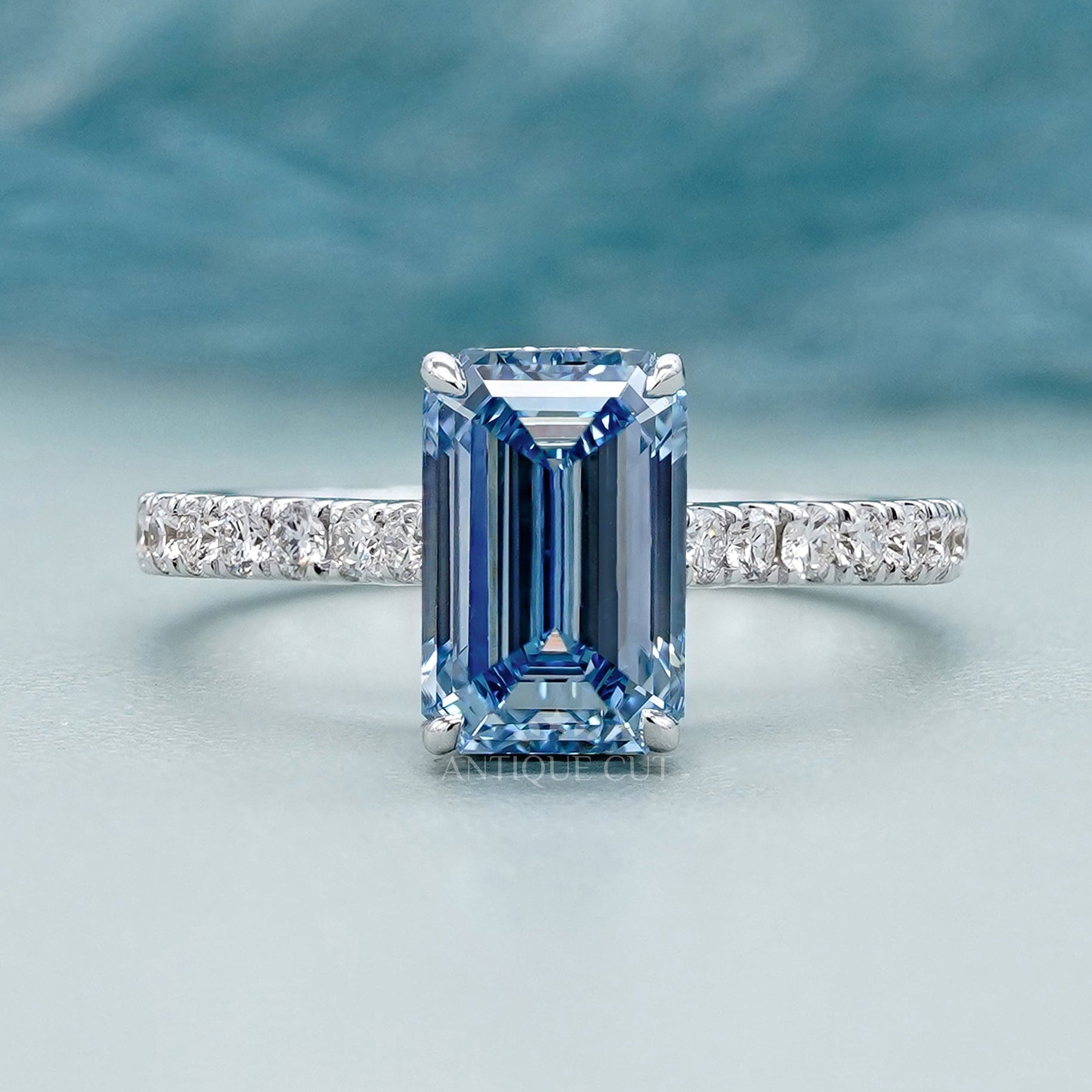 Blue emerald diamond ring hidden halo pave band white gold